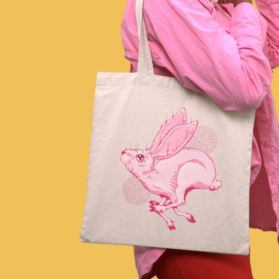 tote-bag-video-featuring-a-woman-with-colorful-skin-stickers-6888v.gif