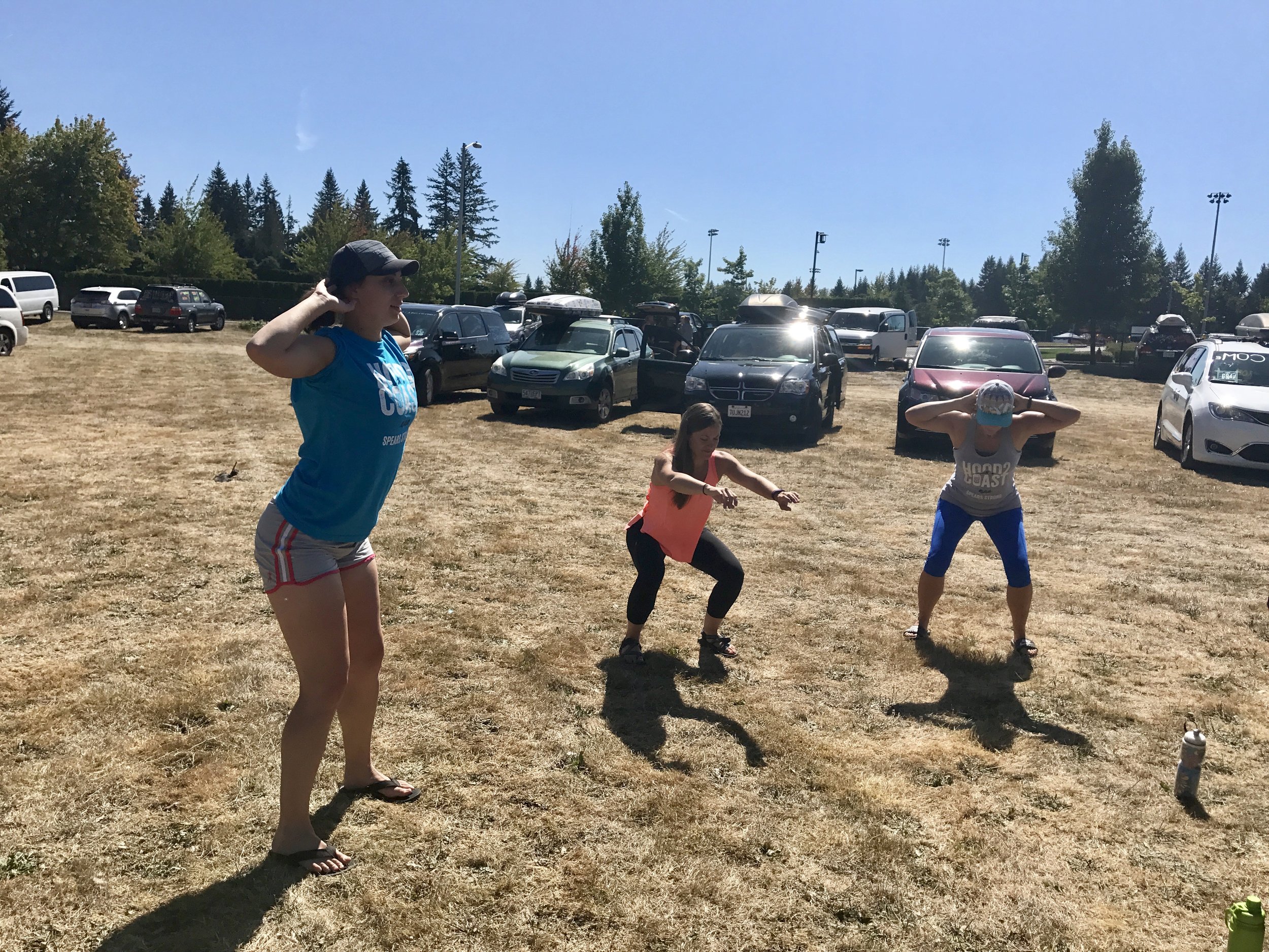 Van 2 staying loose while waiting for the first exchange with Van 1 at Sandy High School. 