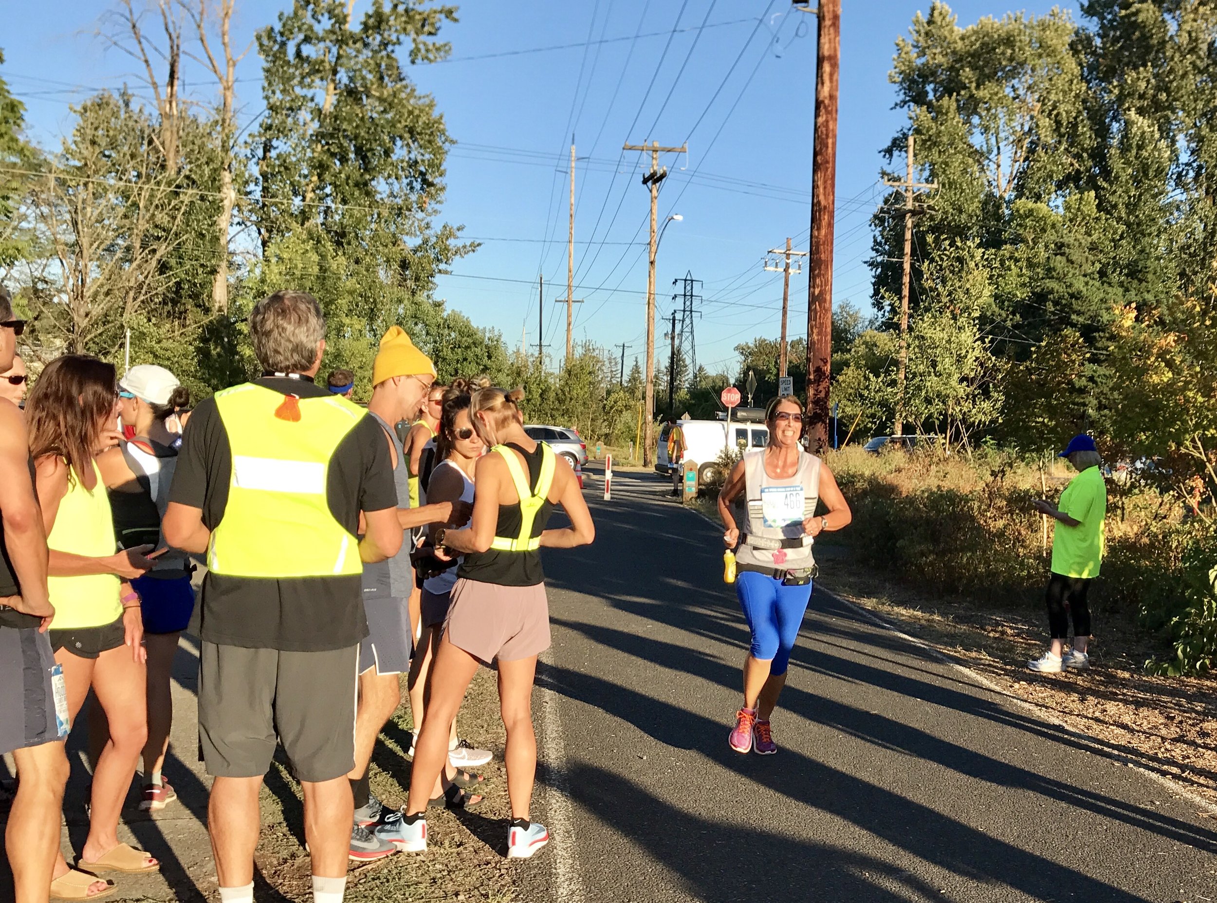  Tifani cruising into Portland to hand off to the final runner after the first leg of runs.&nbsp; 