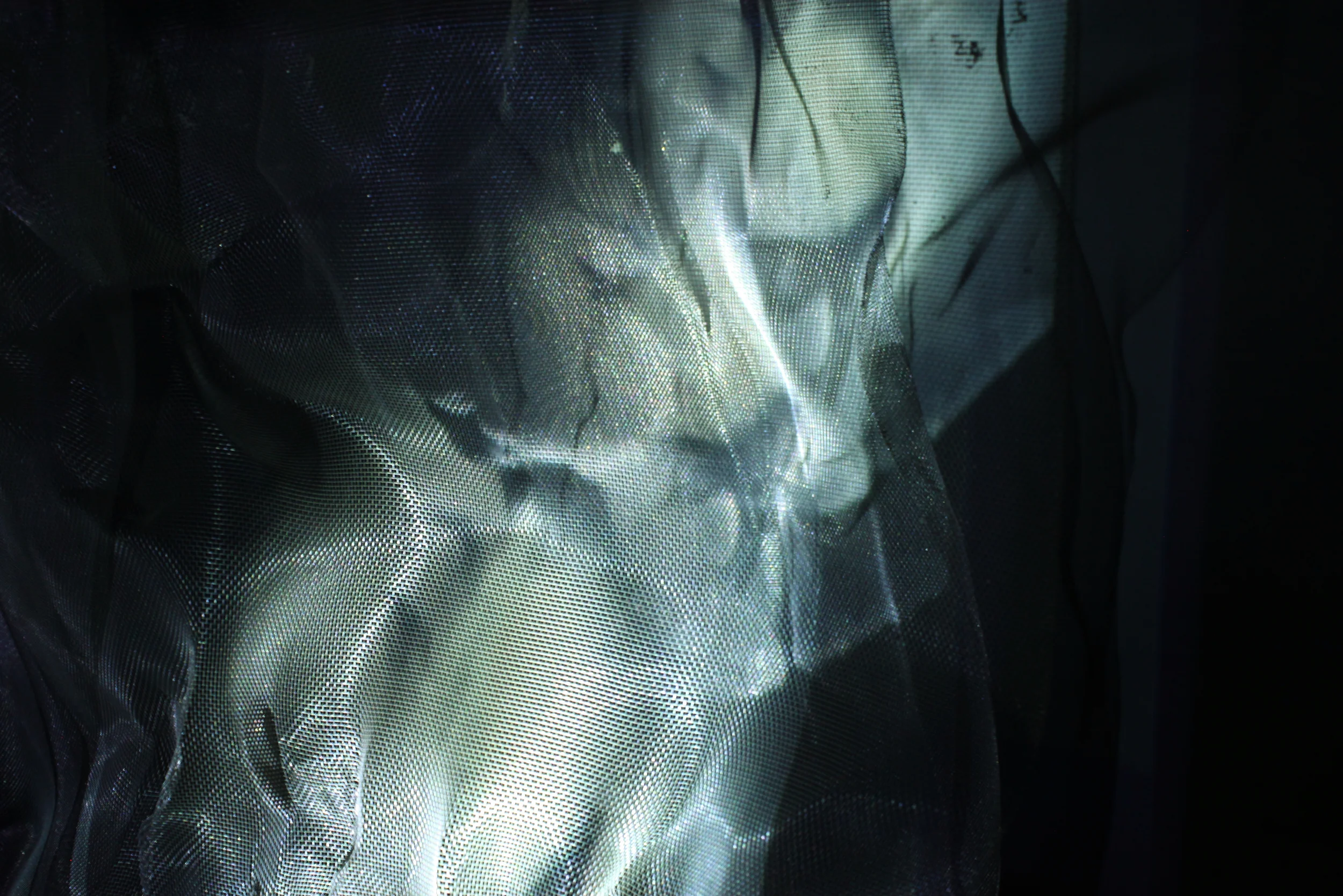  Installation. Video, sound, aluminum mesh 