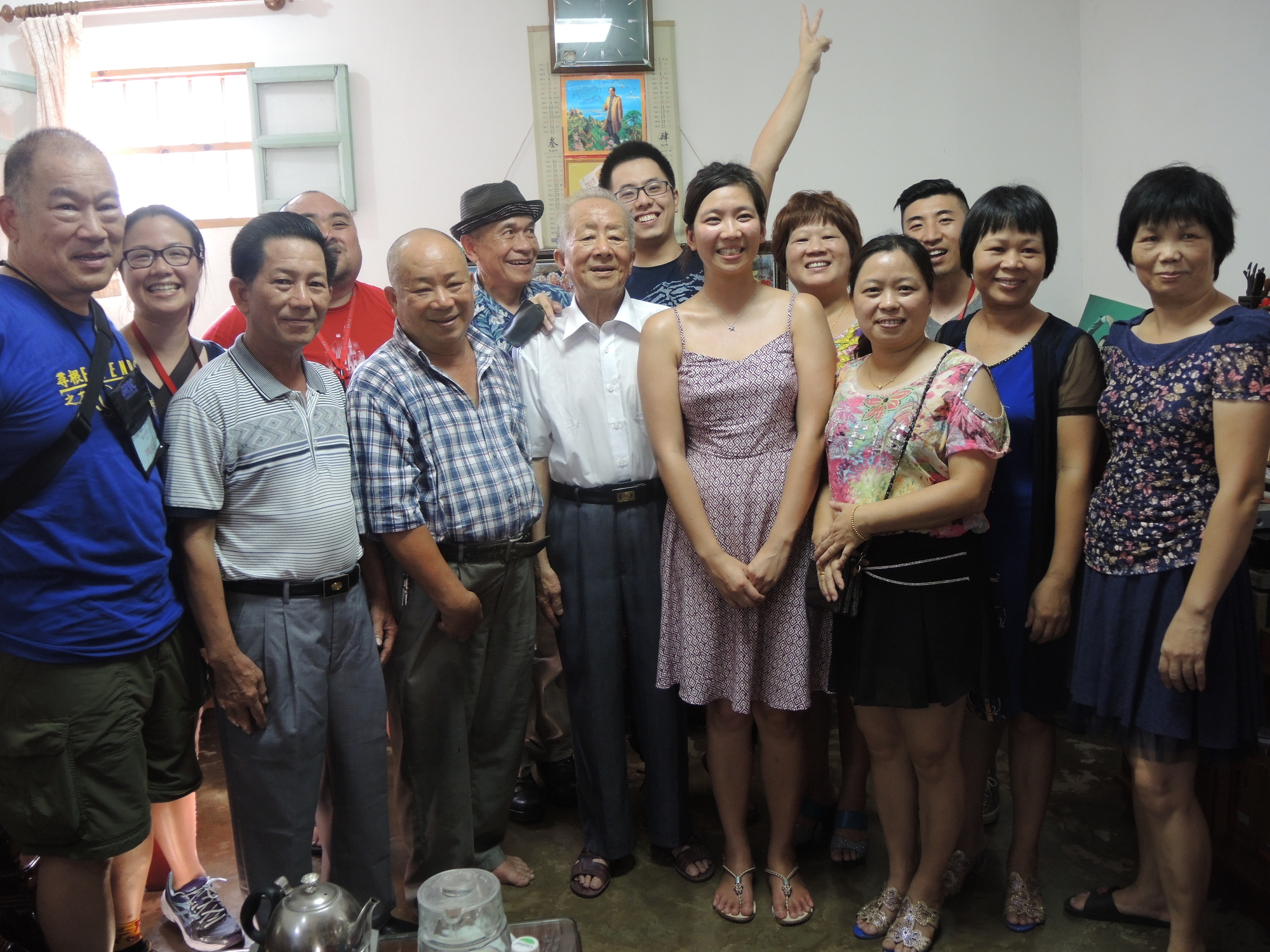 Family group photo with leaders inside third granduncle's home after some kung fu cha