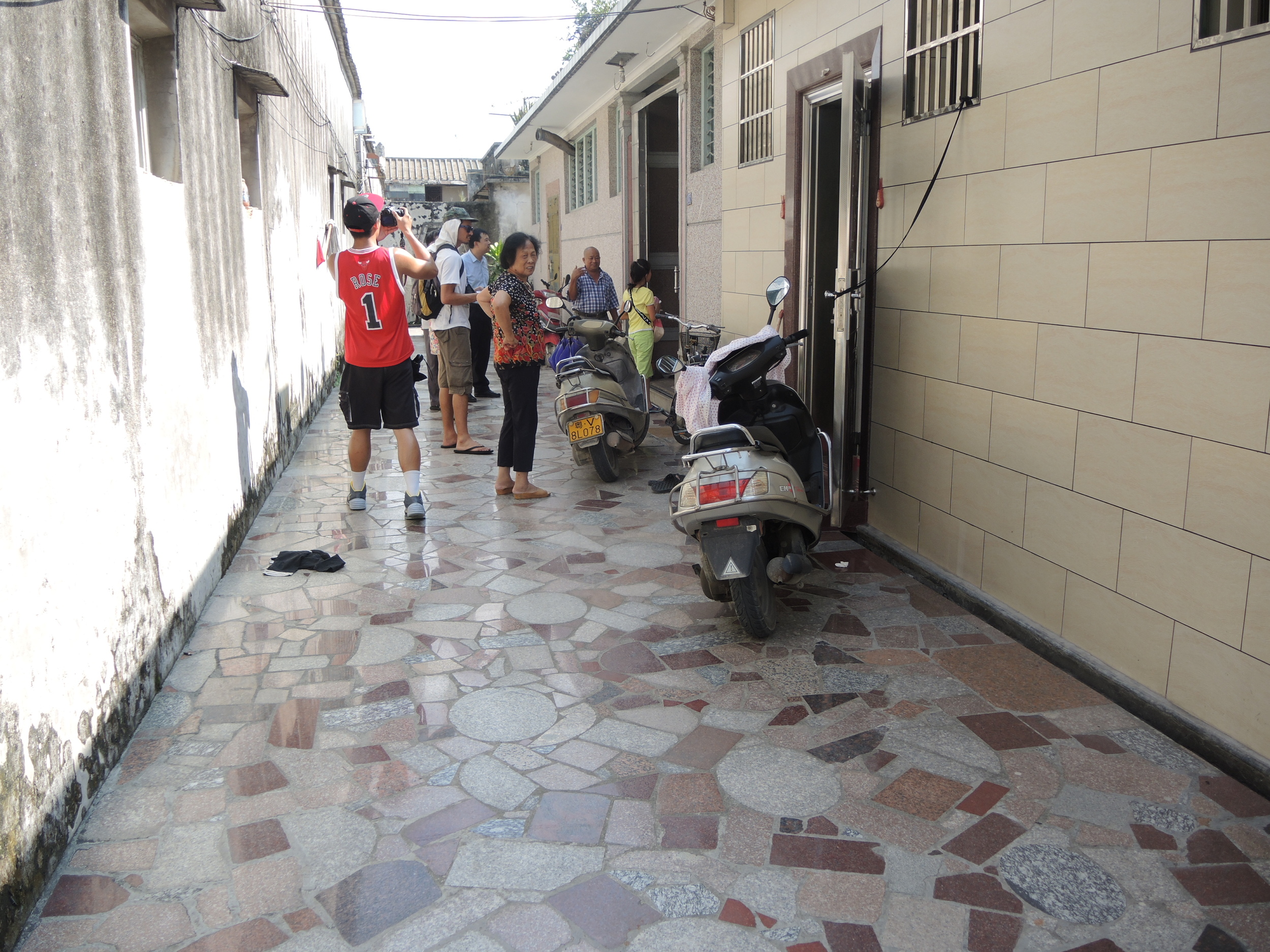 My three granduncles live next door to each other. They paved their pathway/alley with marble stone.