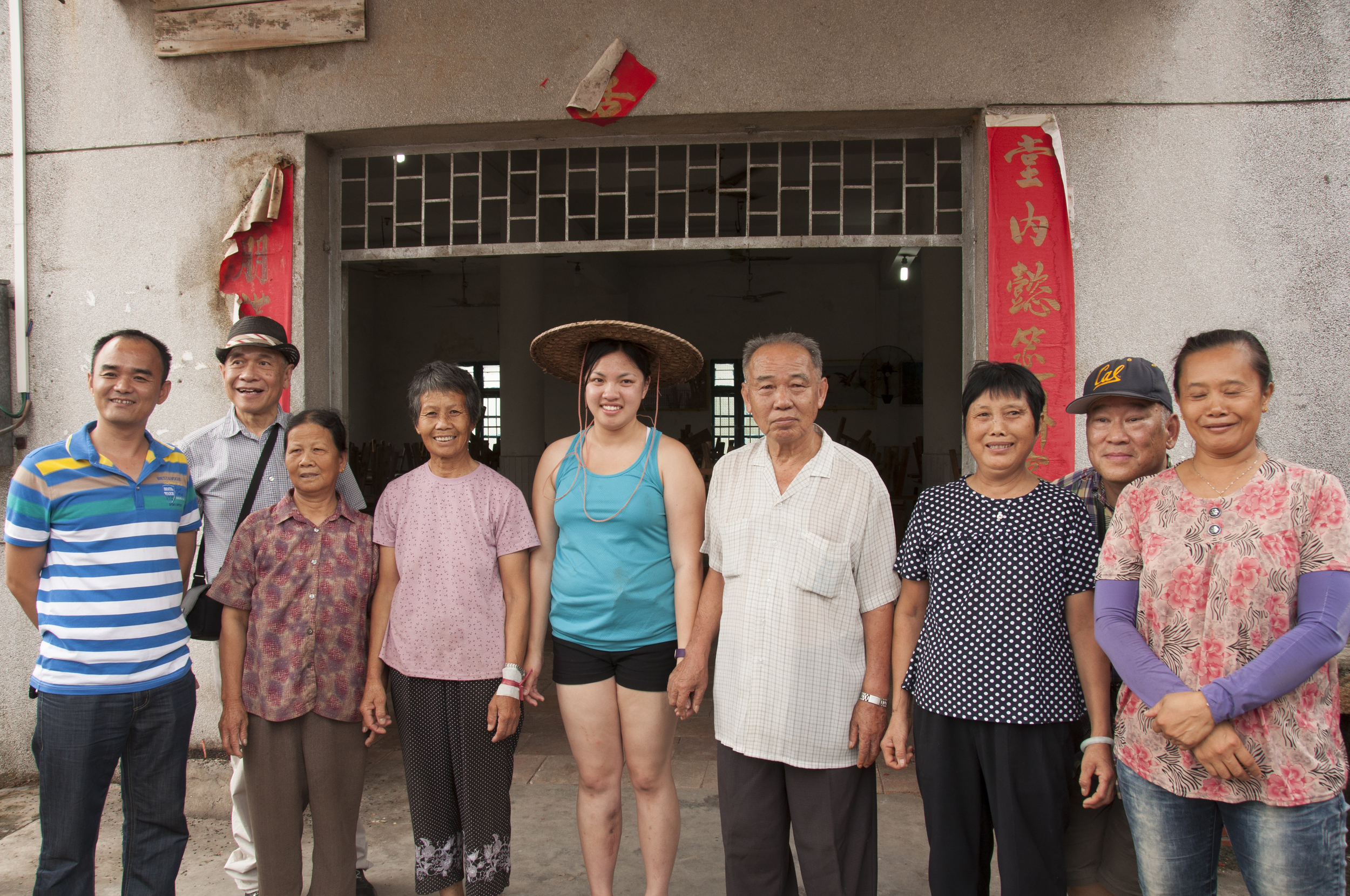 With my paternal great-uncle and villages in front of the community hall