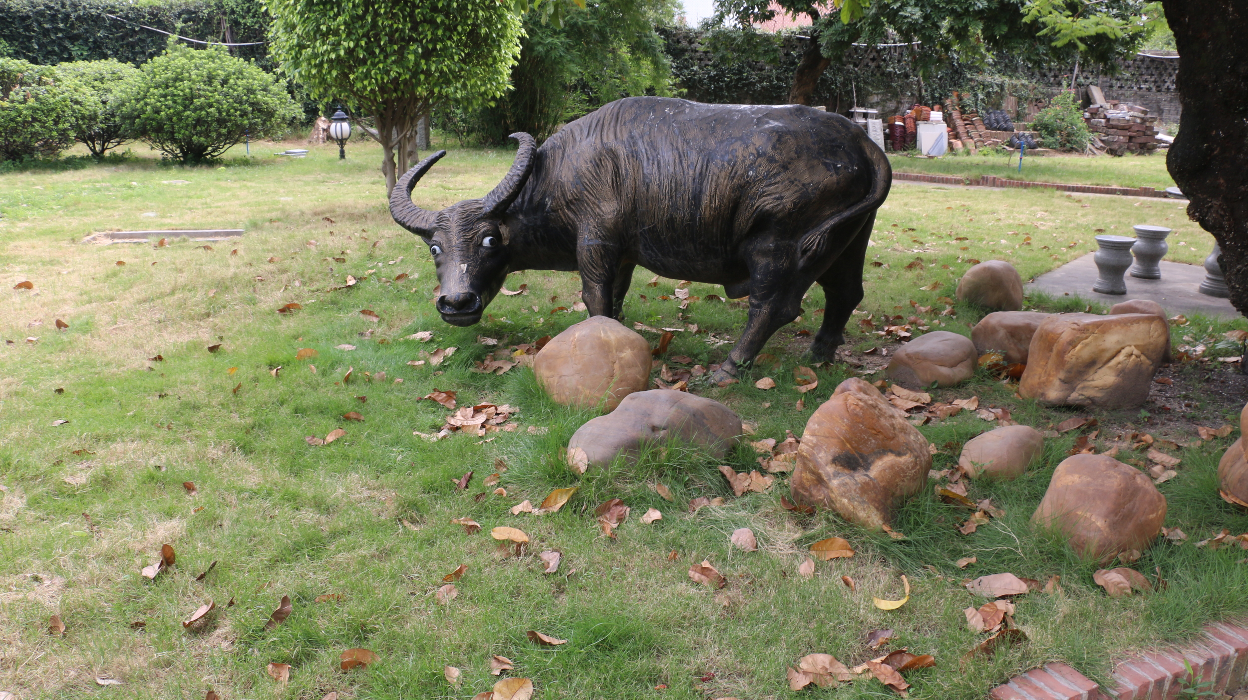 A statue of an ox in the gardens.