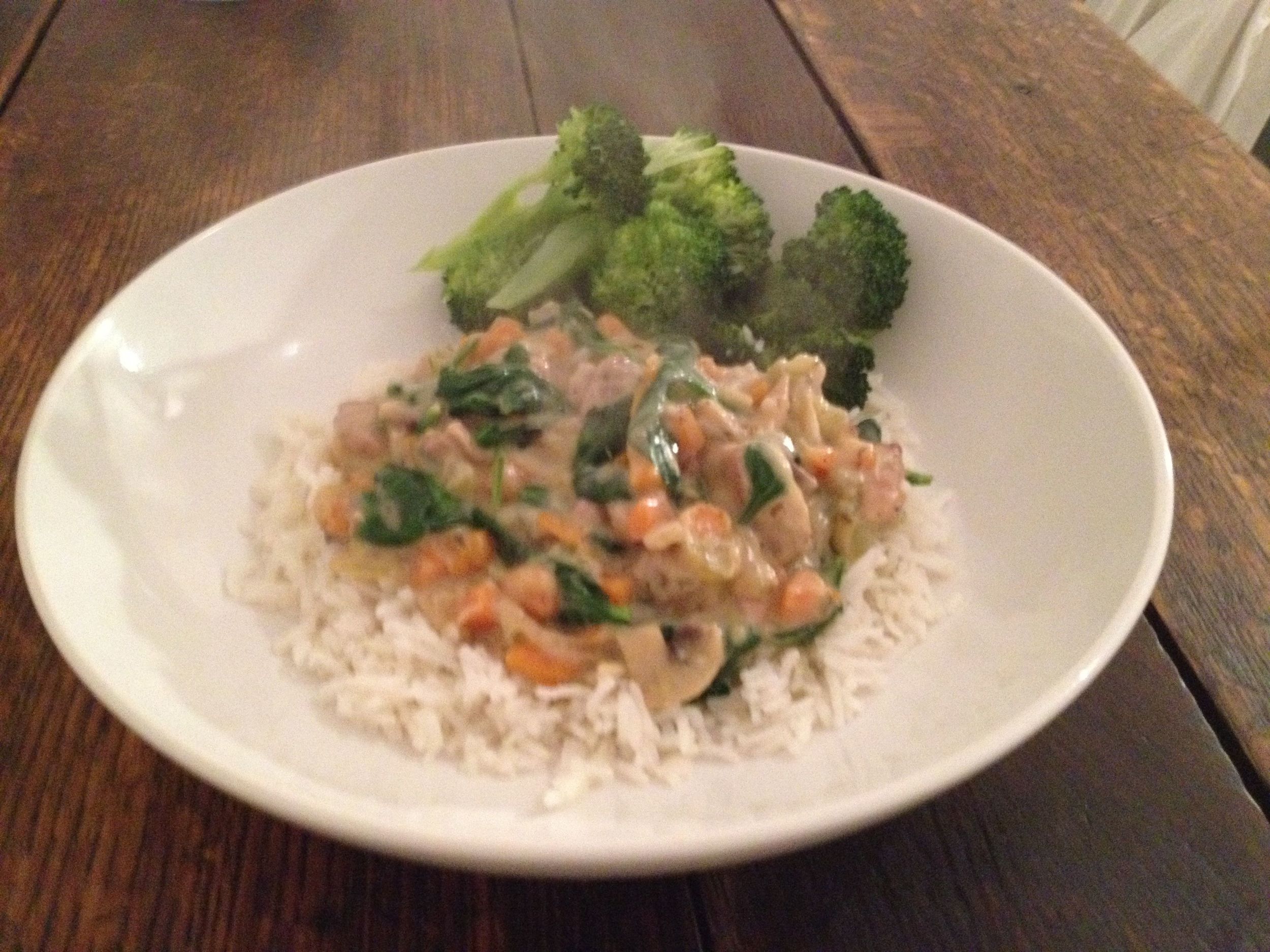 Chicken with creamy mushroom and vegetable sauce