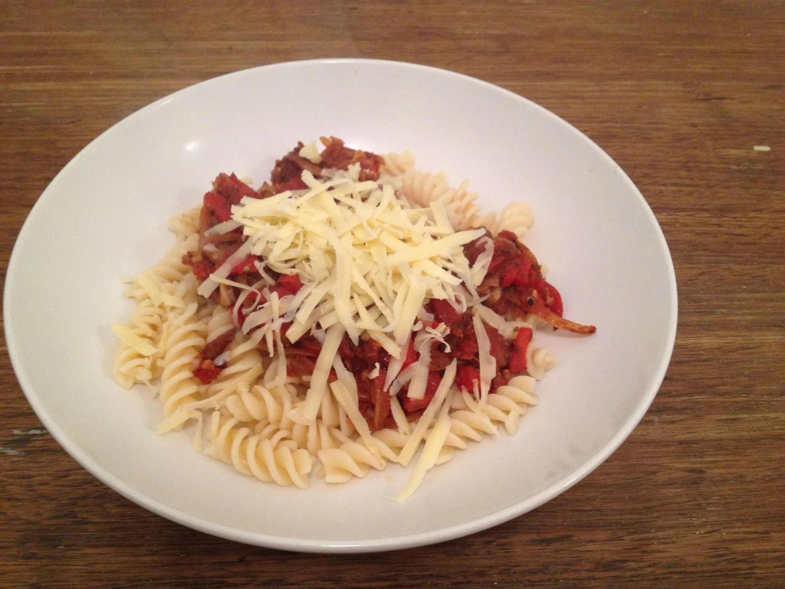 Pasta with tomato and red capsicum sauce