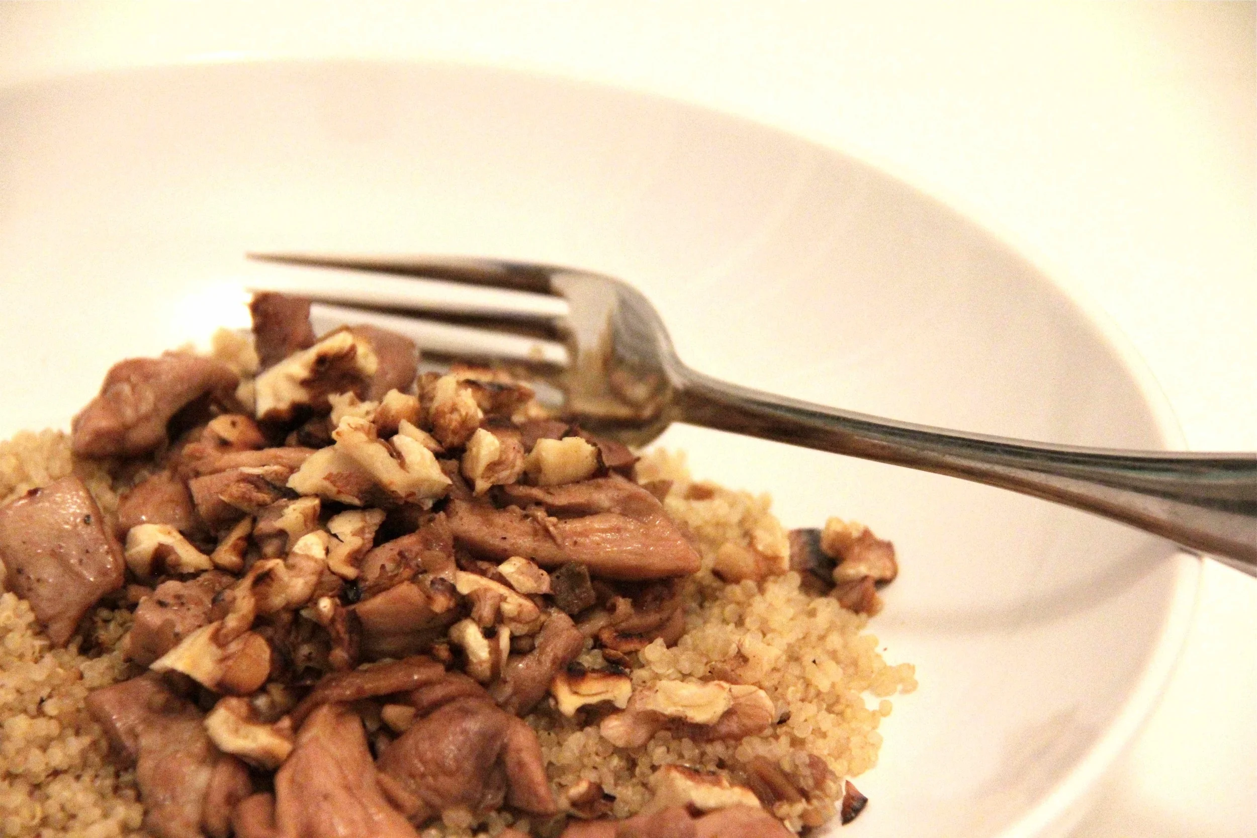 Chicken with white wine, porcini mushrooms & walnuts on quinoa