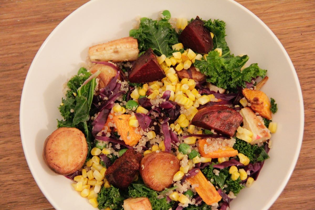 Warm salad with greens, barely and roasted root vegetables