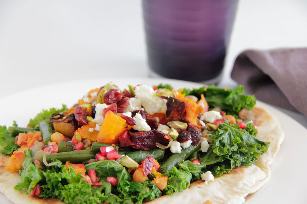 Warm salad with roast pumpkin on flatbread