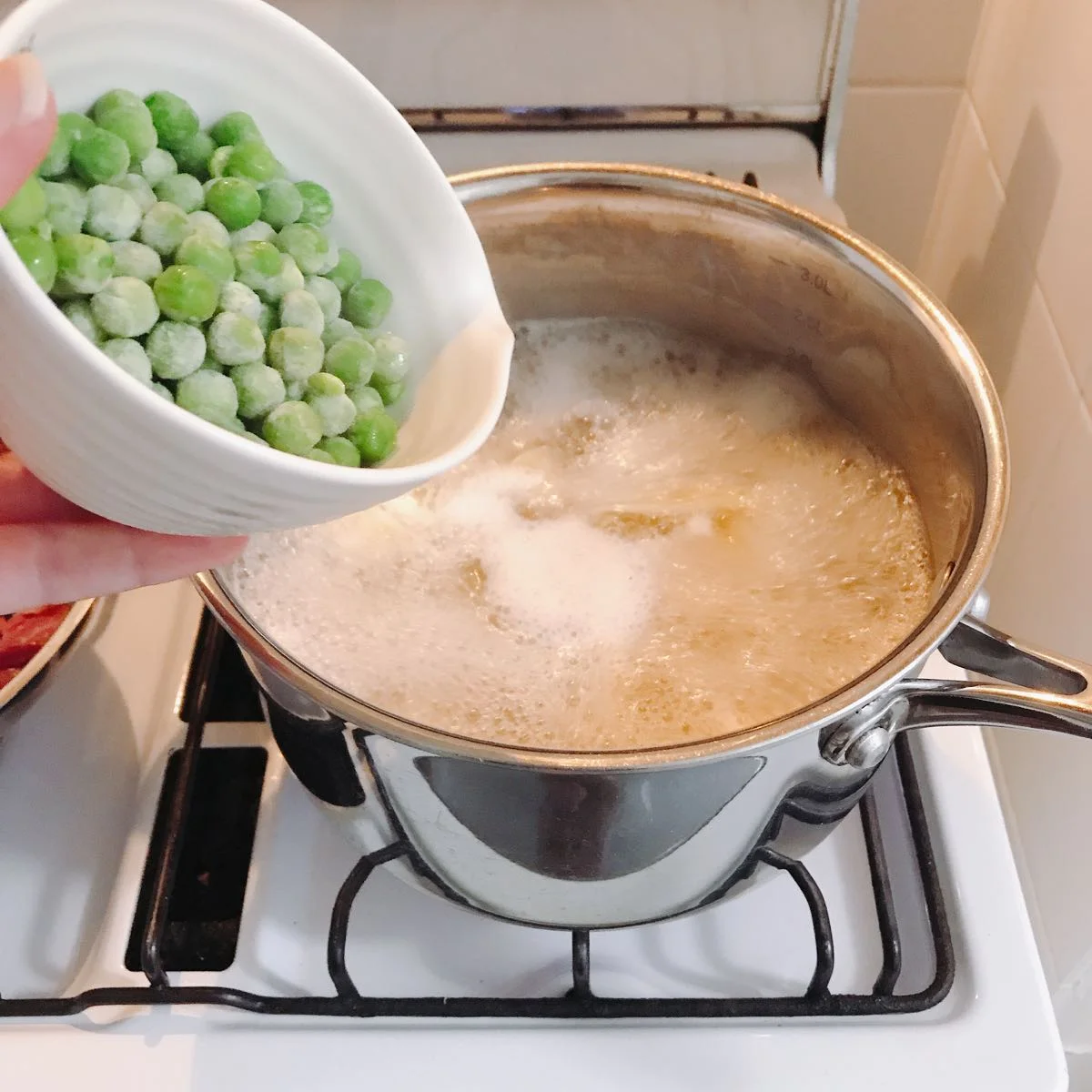 To save on using another pan, I added the peas to the pasta for the last few minutes of cooking.