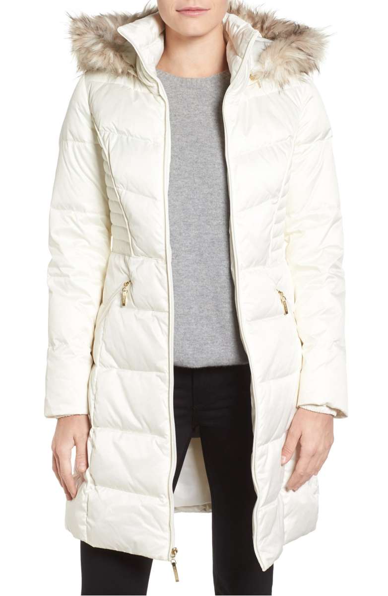 white hooded fur coat