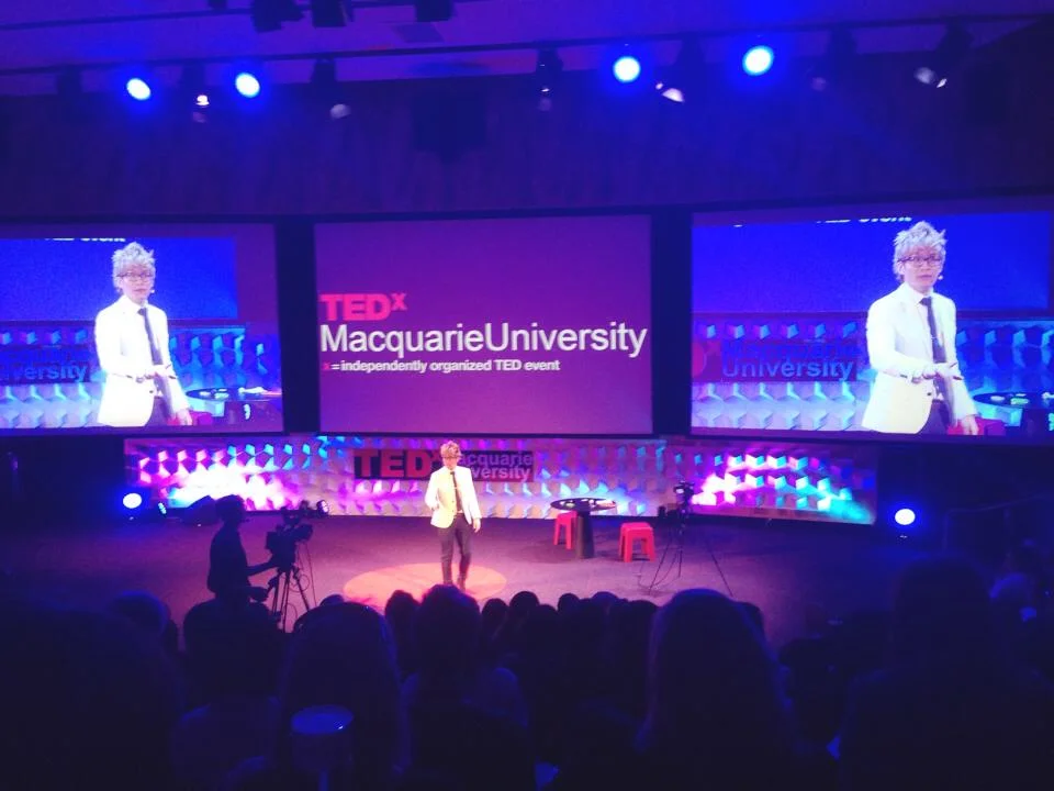 Vinh on the TED stage
