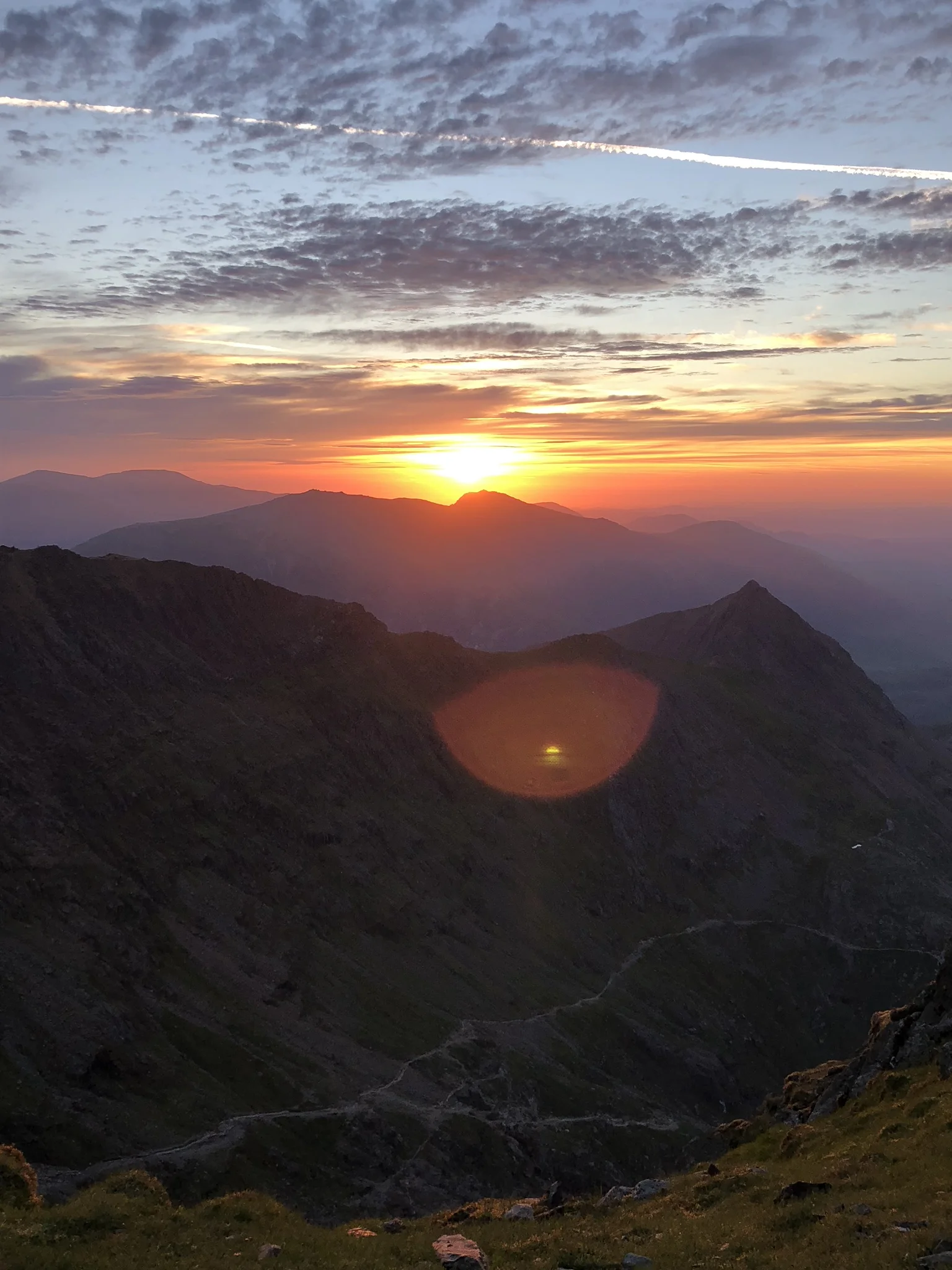 Simply breathtaking. The sun moved slowly but you could see it bursting through. We sat on the summit sipping our Bailey’s and coffee while we took in the view and what we had achieved together.