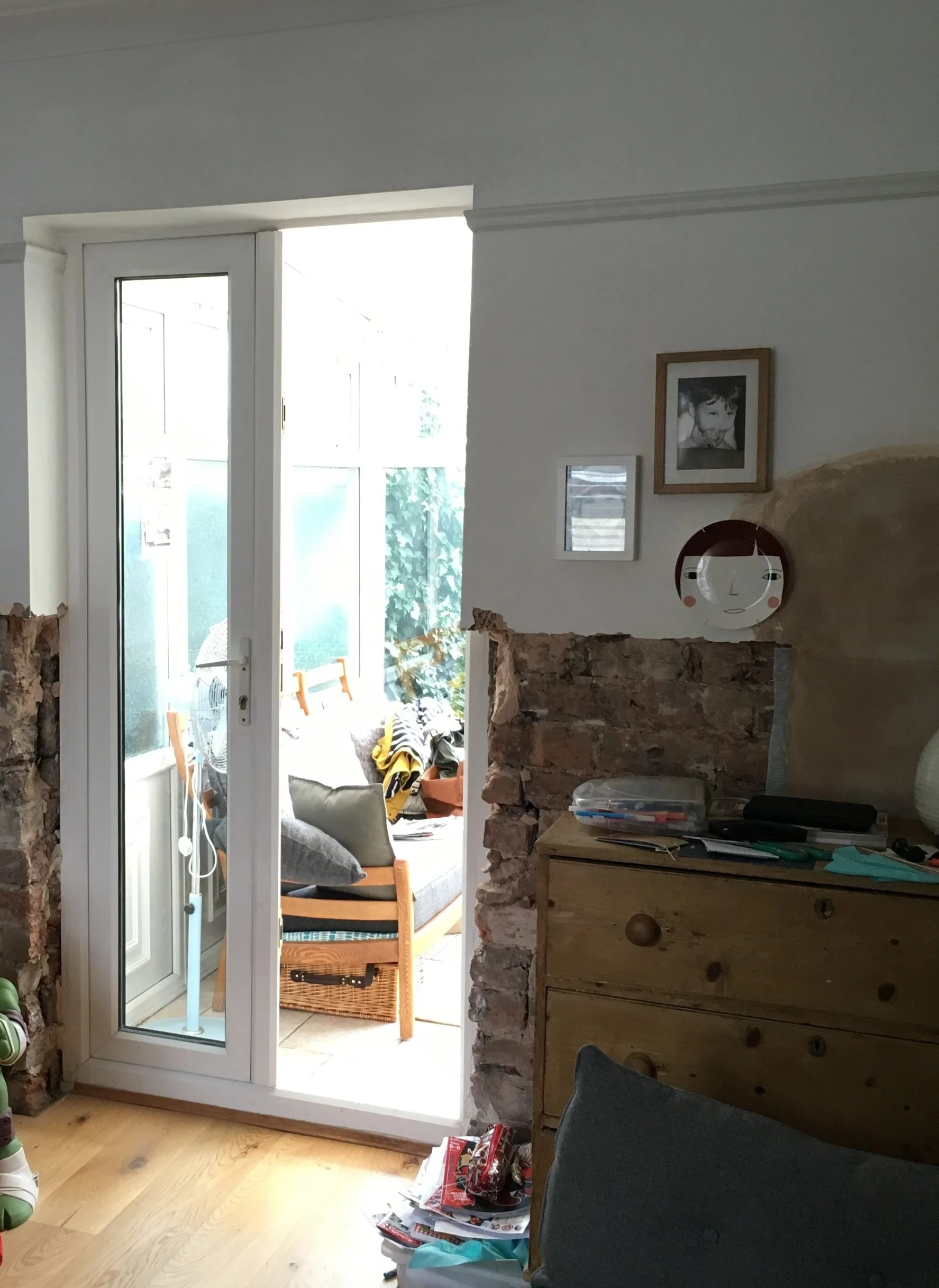 These are the old doors that lead to the conservatory. We had the damp course fitted first which is why there is plaster missing on the walls. We lived with this for over a year!