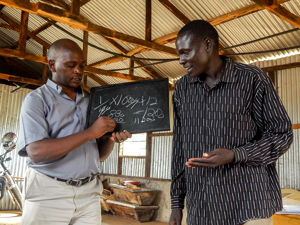 Staff of the Nakuru Community Development Trust explain basic interest to a new trust group in the Kadokoi parish, Nakuru Diocese, Kenya.