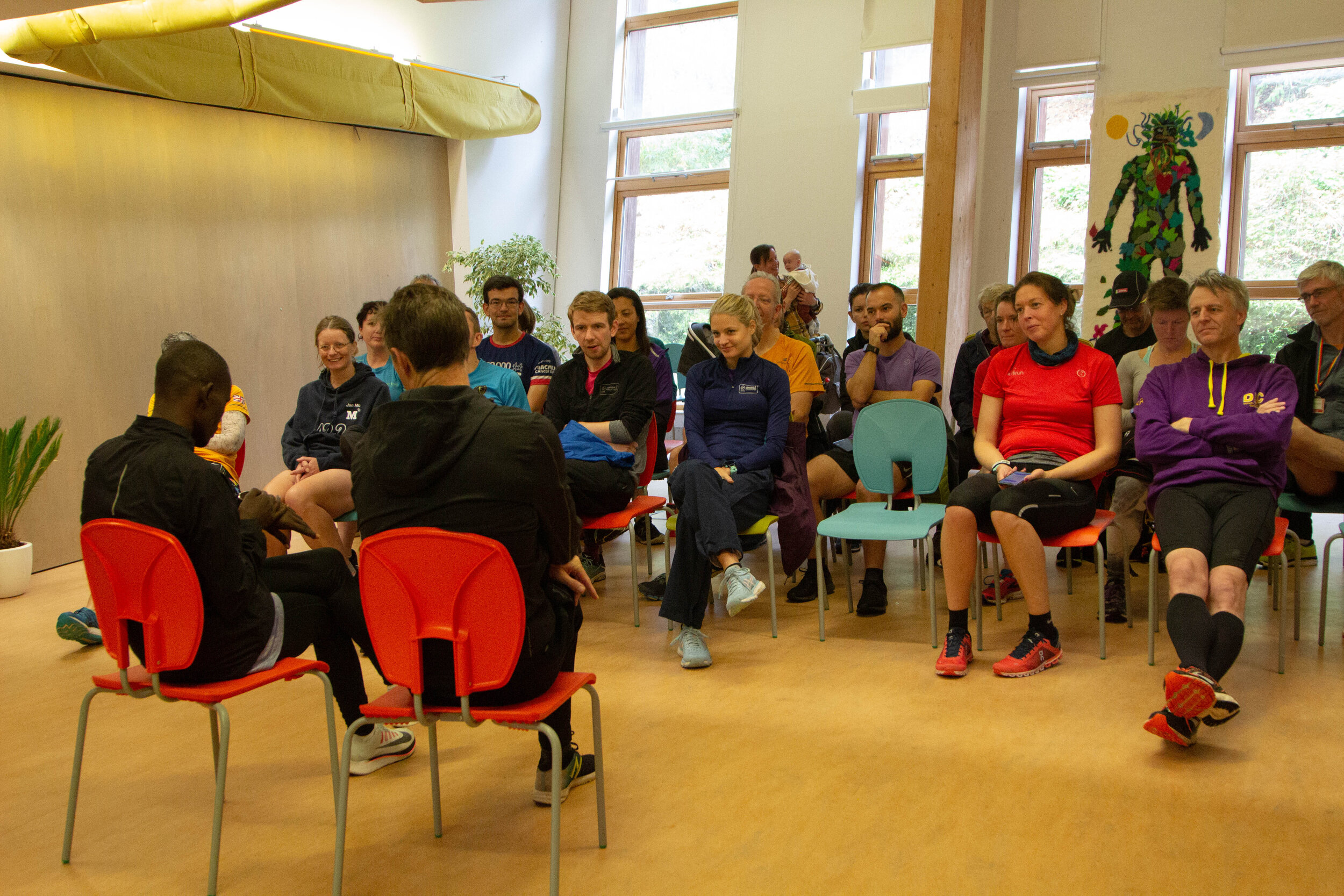  Martin &amp; Benard give some training tips to our runners in an exclusive session after parkrun. 