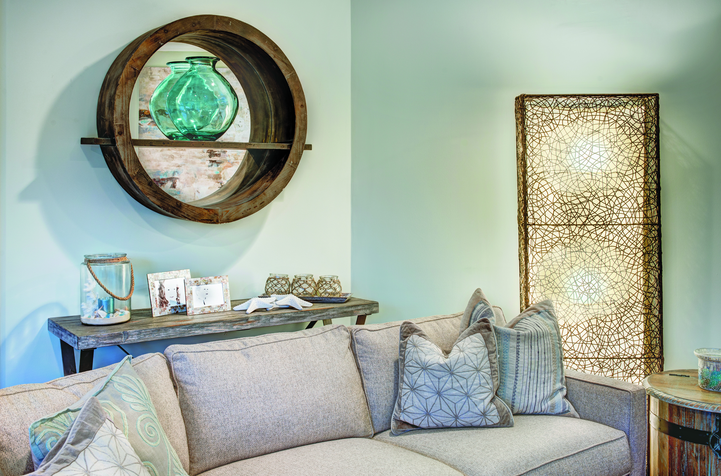 Lighting and mixed accent pieces create a warm and inviting family room.