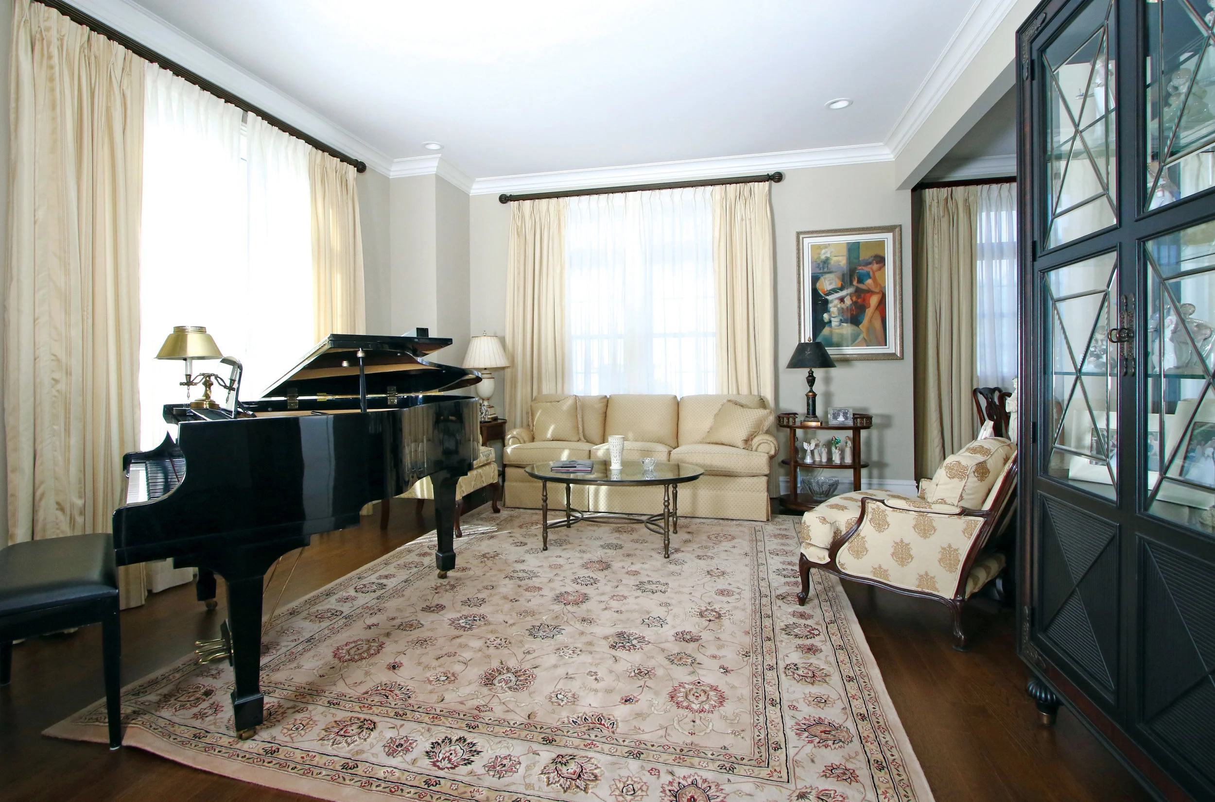 This living room/music room houses family collectibles and a player piano which is also played by the children.
