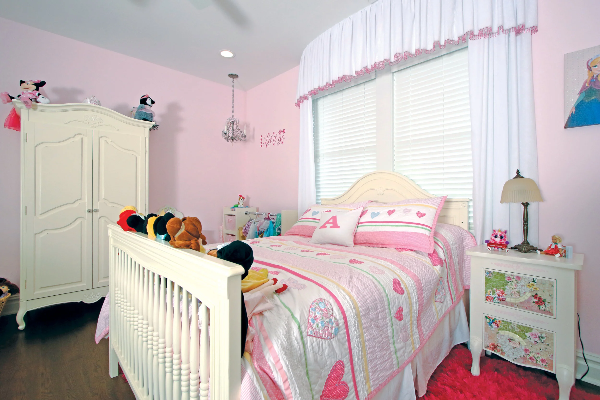 A pink and white "princess room" is perfect for this adorable 4 year old now and later.