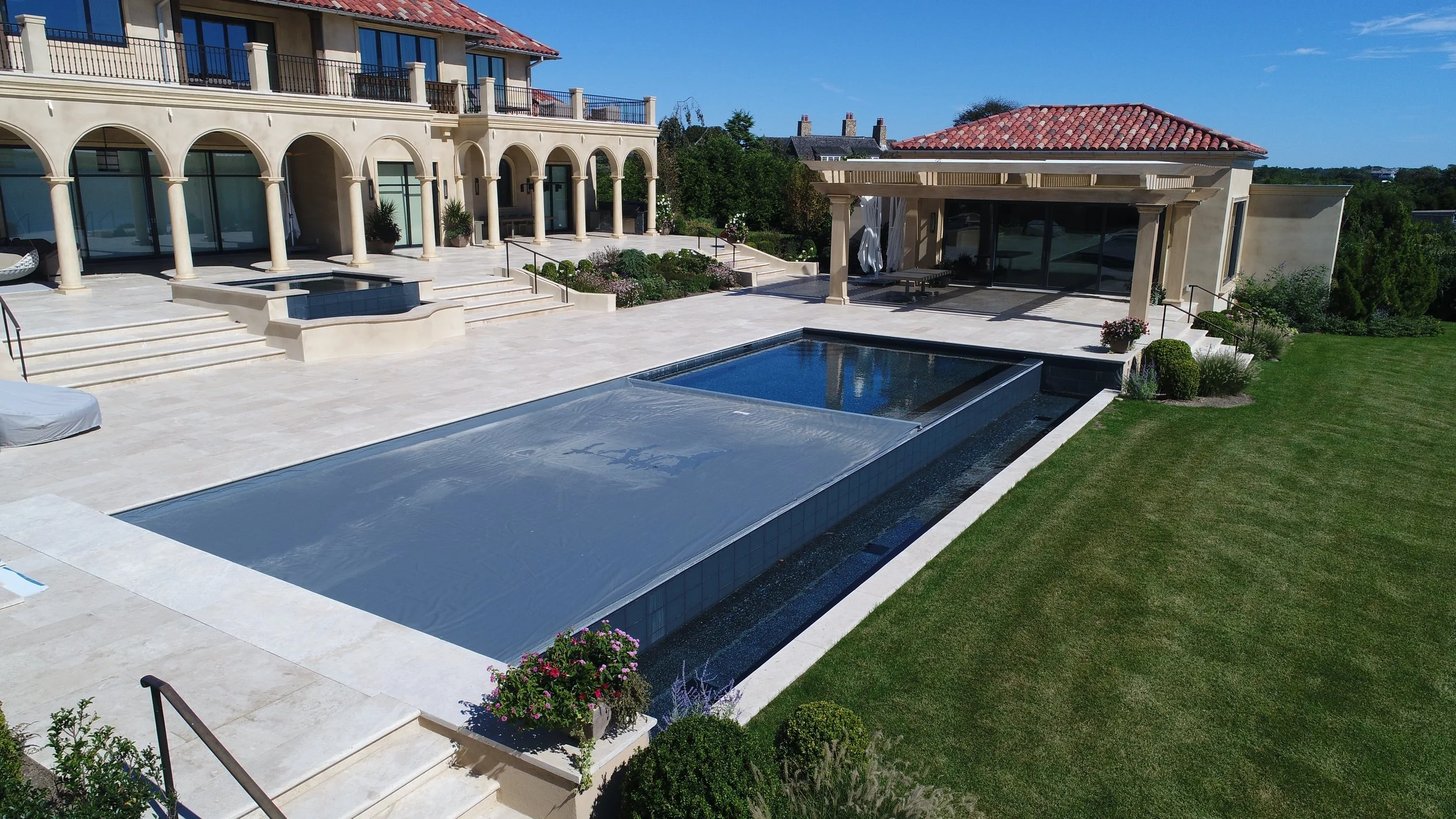 Cat14 Auto Cover w tracks Gold Pelican Pools.jpg