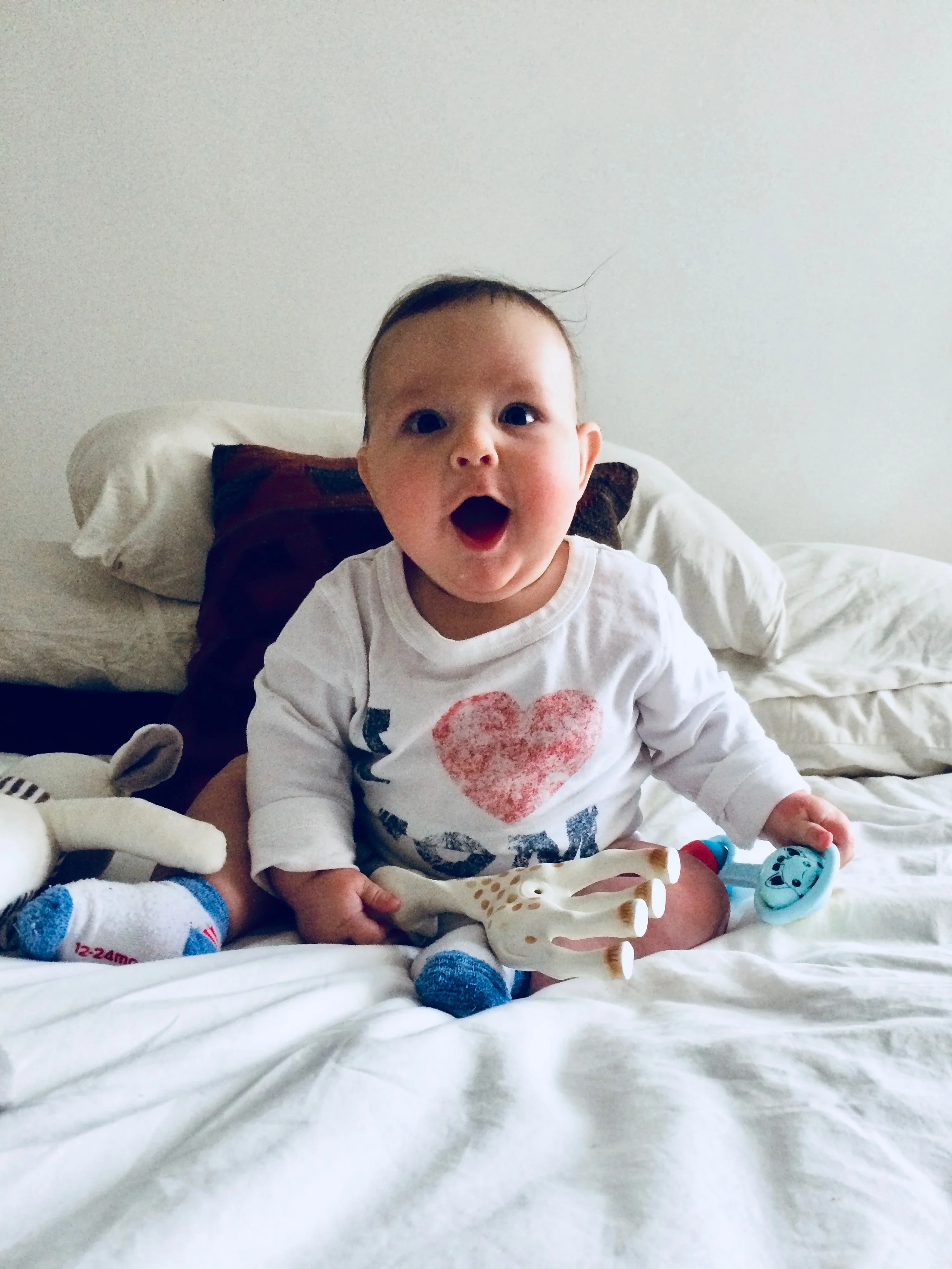 Little dude is getting pretty good at sitting up on his own.