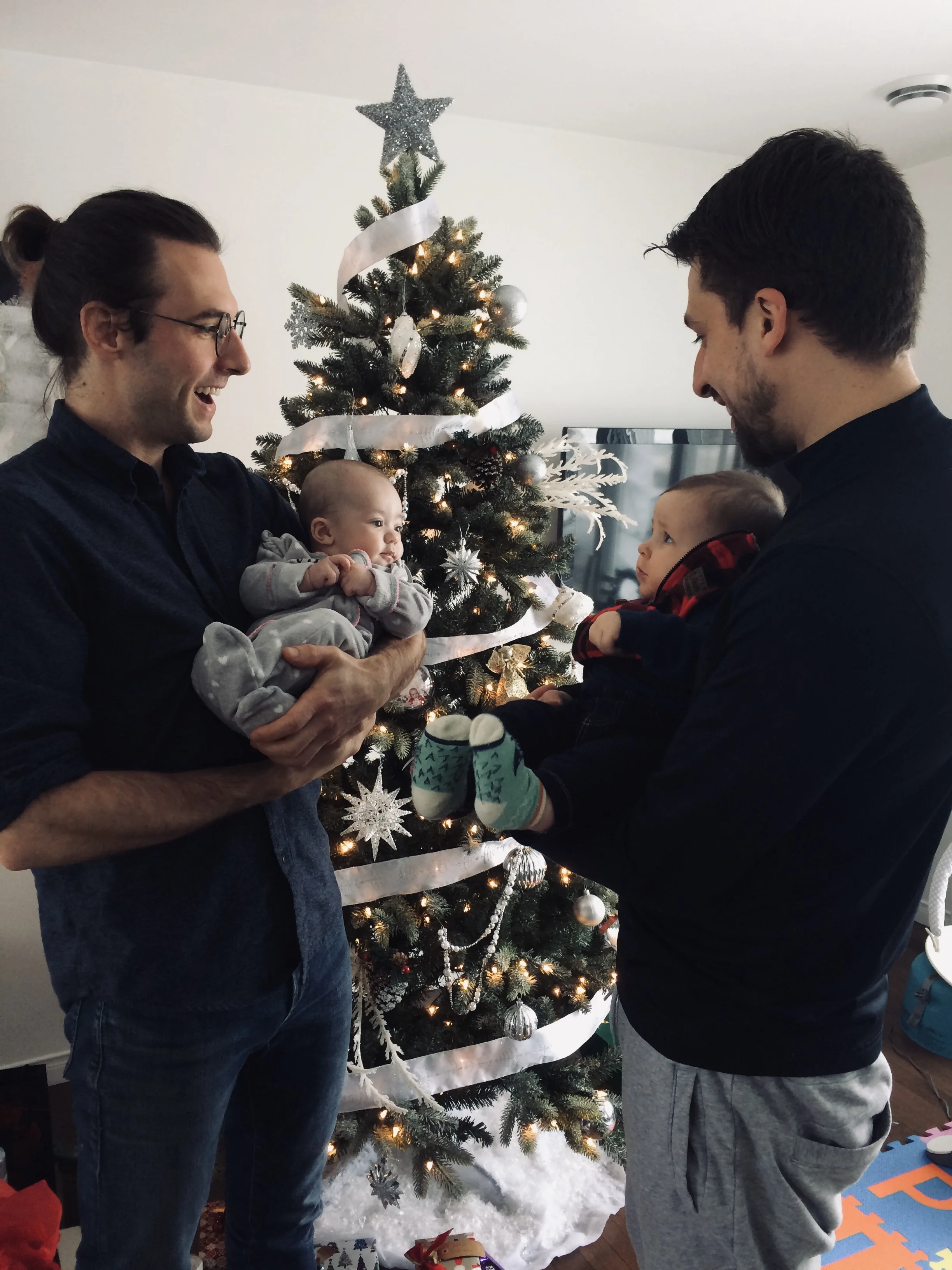 Old schoolmates grow up and have babies! mat is holding david’s new baby girl, Julia. Benji is so outnumbered by gals!