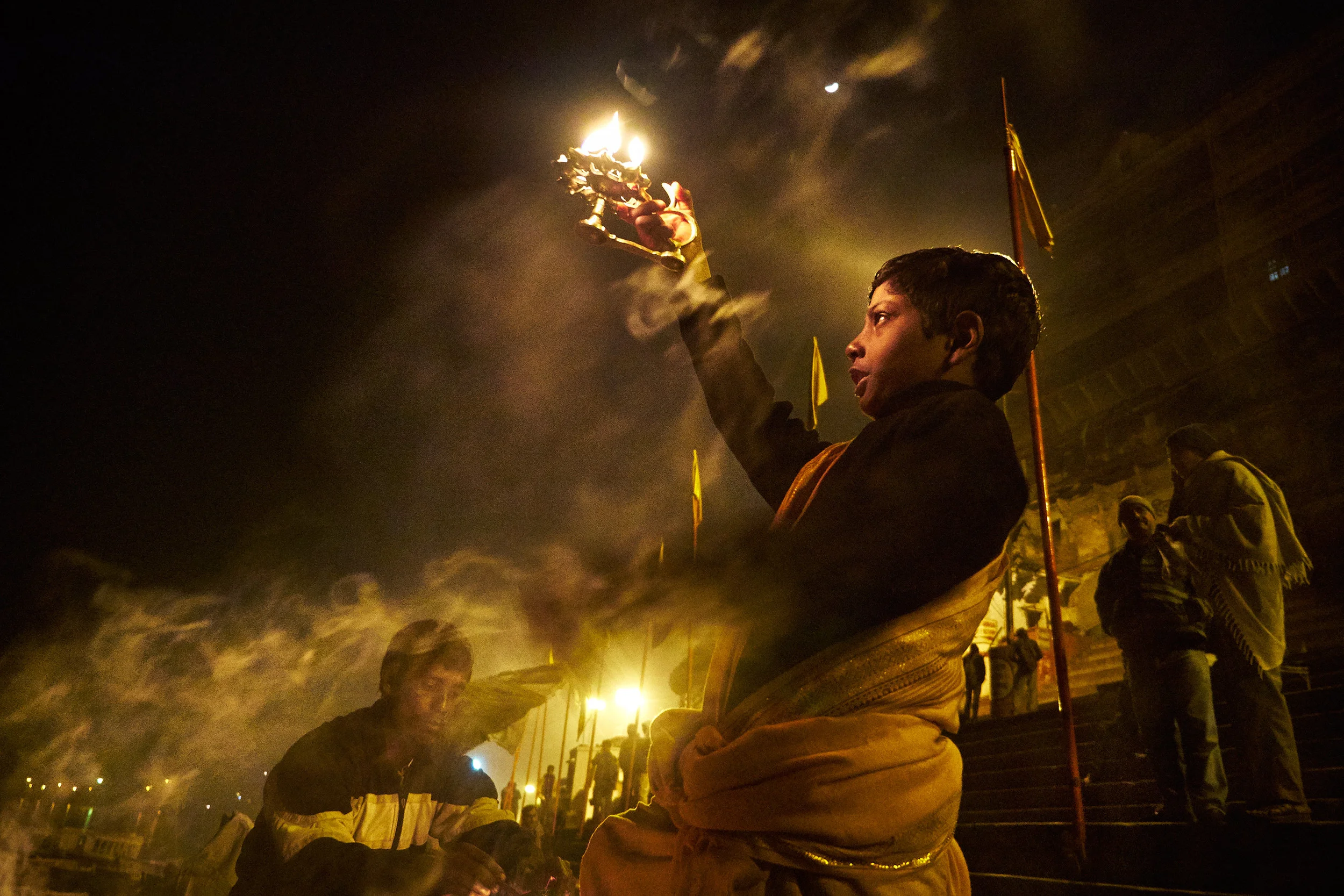 Young boy doing puja