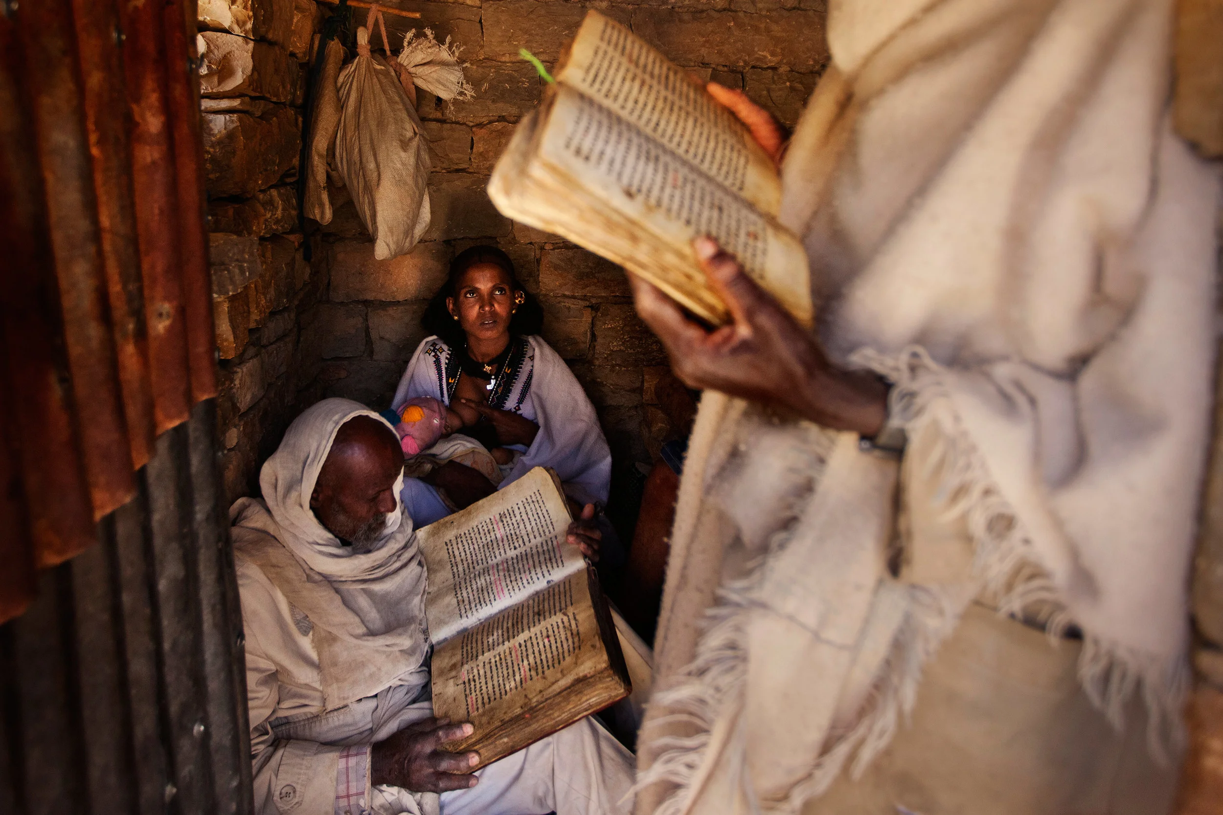 Priests-reading-prayers-during-a-baptism-in-a-small-countryside-church-in-Enderta-area,-Tigray.jpg