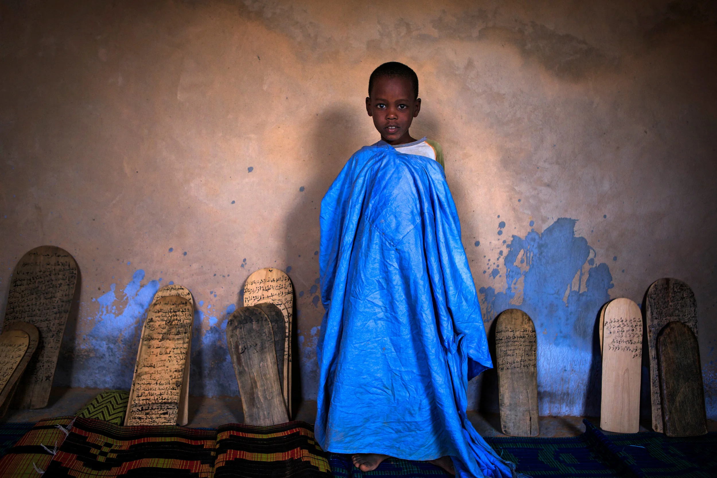 Mauritania,-Adrar---Boy-dressed-in-a-bubu-in-a-Mahadara-Islamic-school.jpg