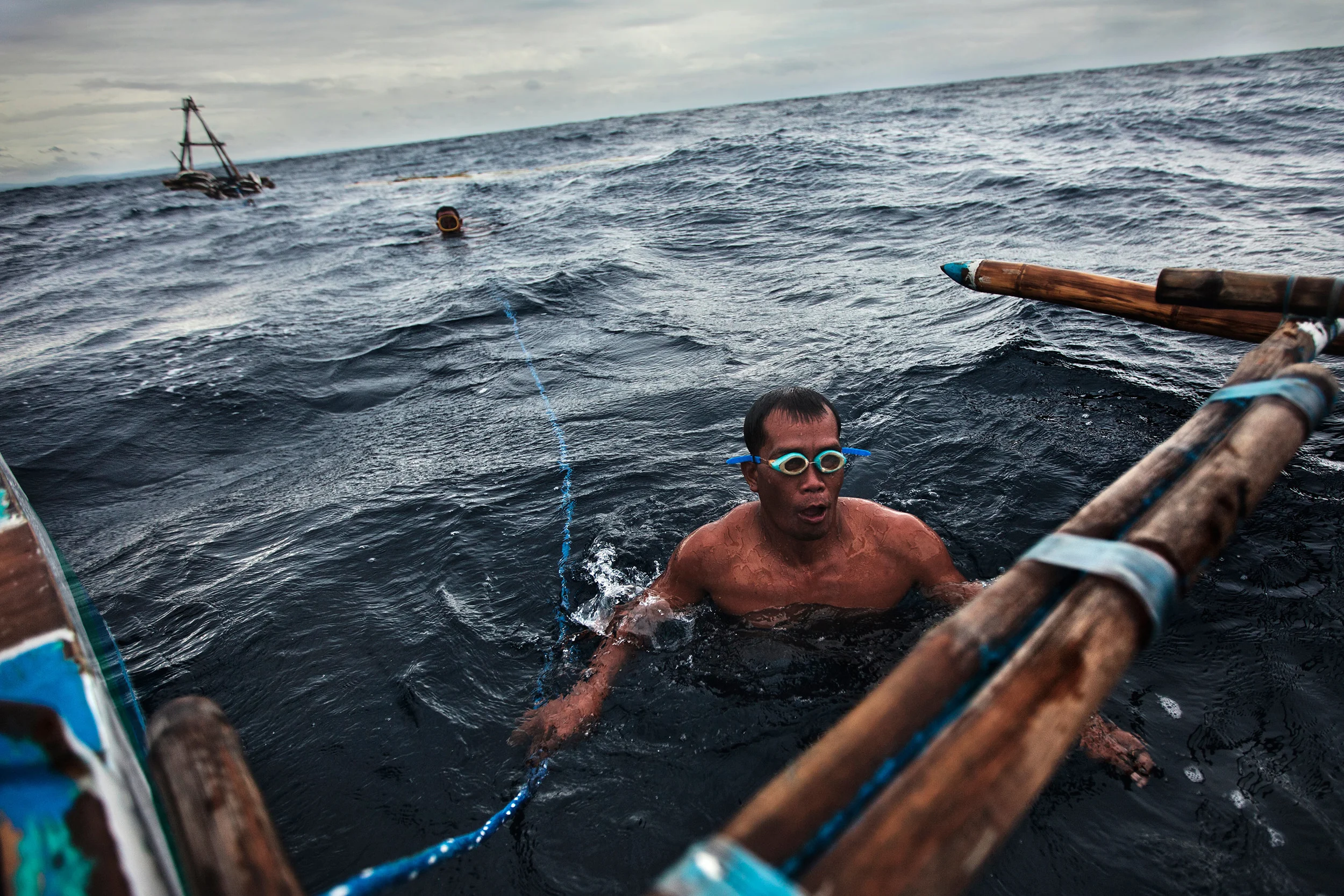 Fisherman-grasping-for-air-during-a-rough-day-on-the-sea.jpg