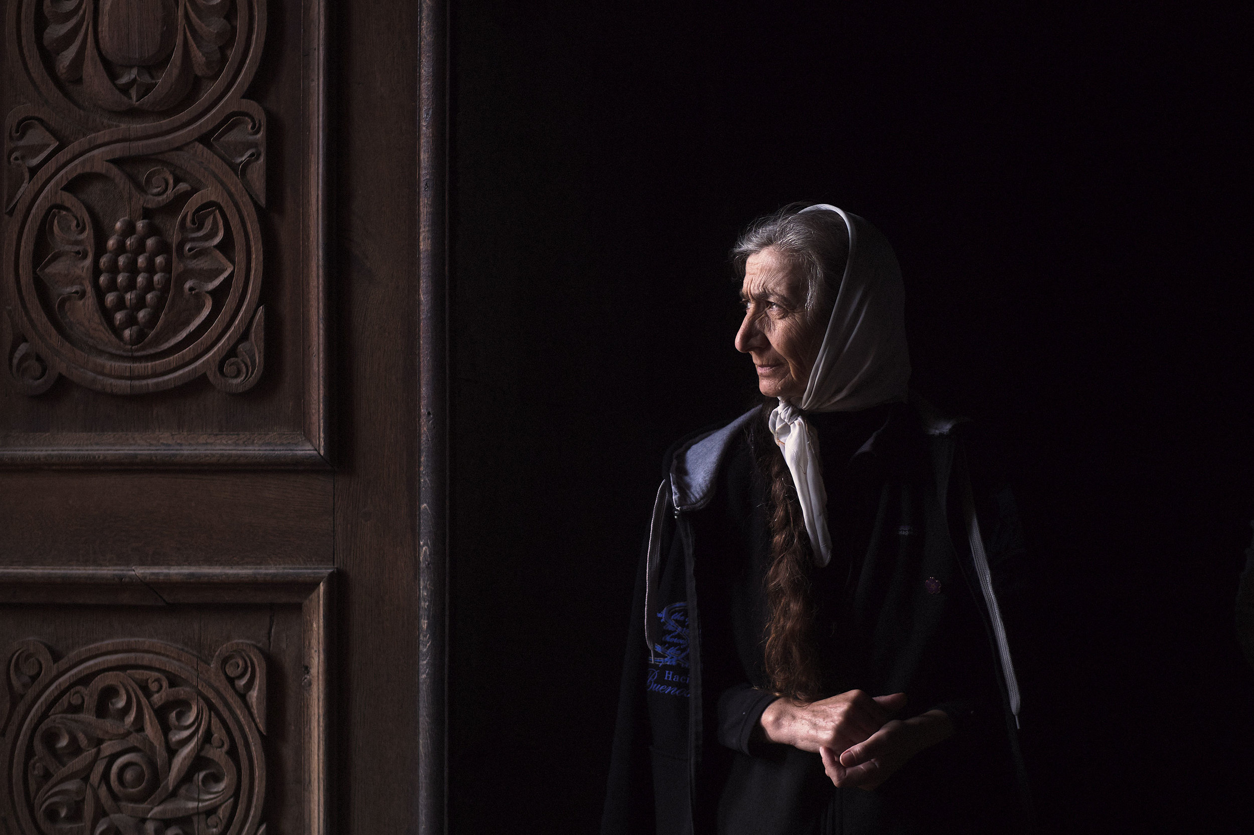 Armenia,-Tatev-monastery---woman-by-the-church-door_1144784.jpg