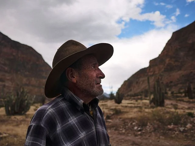 The old cowboy of Cotahuasi canyon. Leonardo lives with his wife on a remote farm inside the canyon. They're self-sufficient, but lately Leonardo has been feeling a bit sick. Dizzy, short of breath. I asked if he wanted to go to a doctor "Yeh, maybe." He replied without much urgency. 
I guess the folks that live a lifestyle like his aren't too much into doctor visits. I changed the topic " Do you think it's gonna rain?" Leonardo looked at the sky and said "Hmmm, maybe. Yeh. I think it will. The road becomes dangerous with rain." On that note I said goodbye and headed back to town, along that incredibly narrow road which would become impassable with even the slightest landslide.

#Cotahuasi #cowboy #canyon #cotahuasicanyon #rurla #Peru #adventure #potrait #travelphotography #travelphotographer #people #naturalportrait #panasonic #lumix #gx80