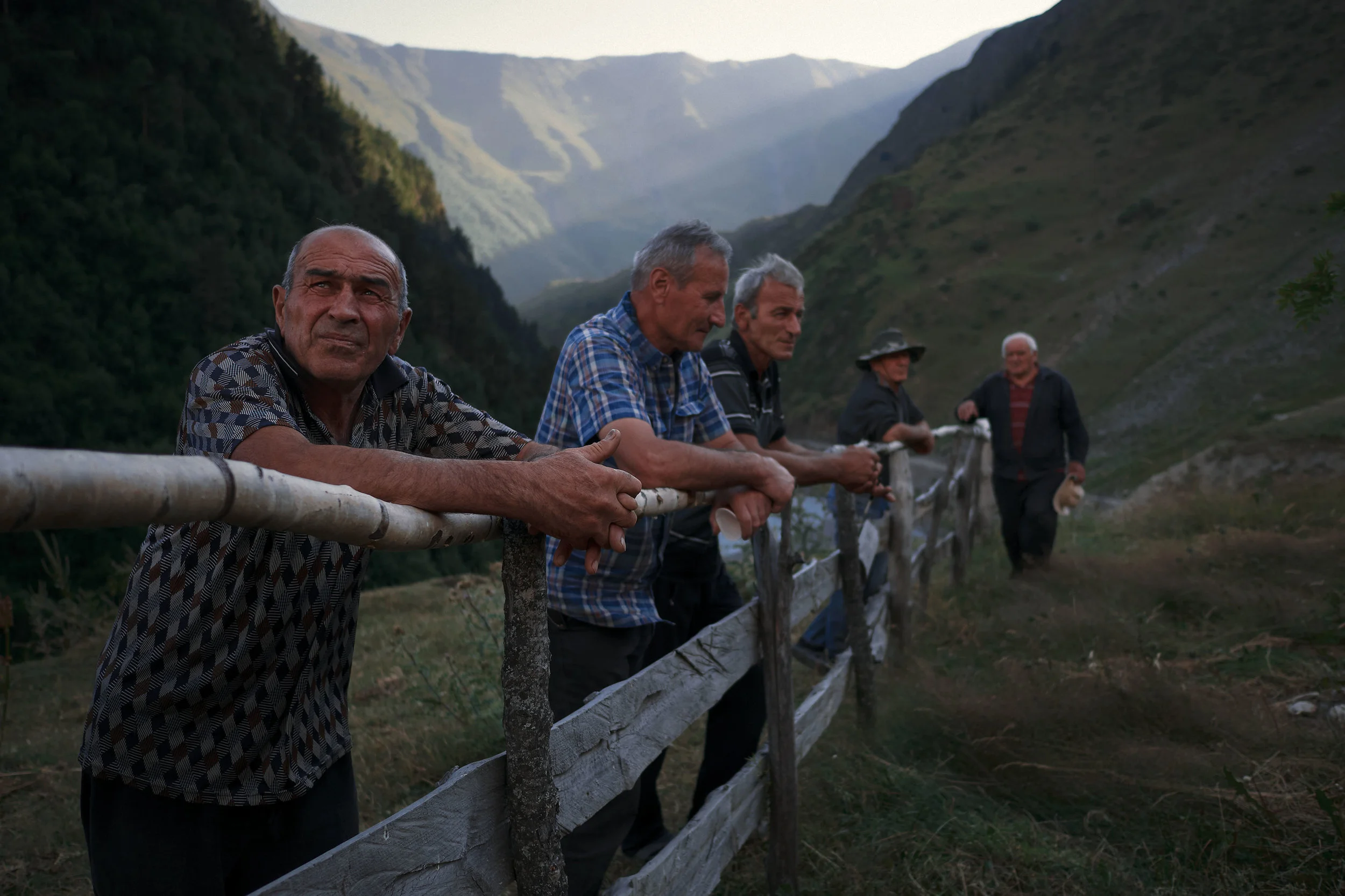 Tusheti-Georgia-village-men-wait-for-celebration.jpeg