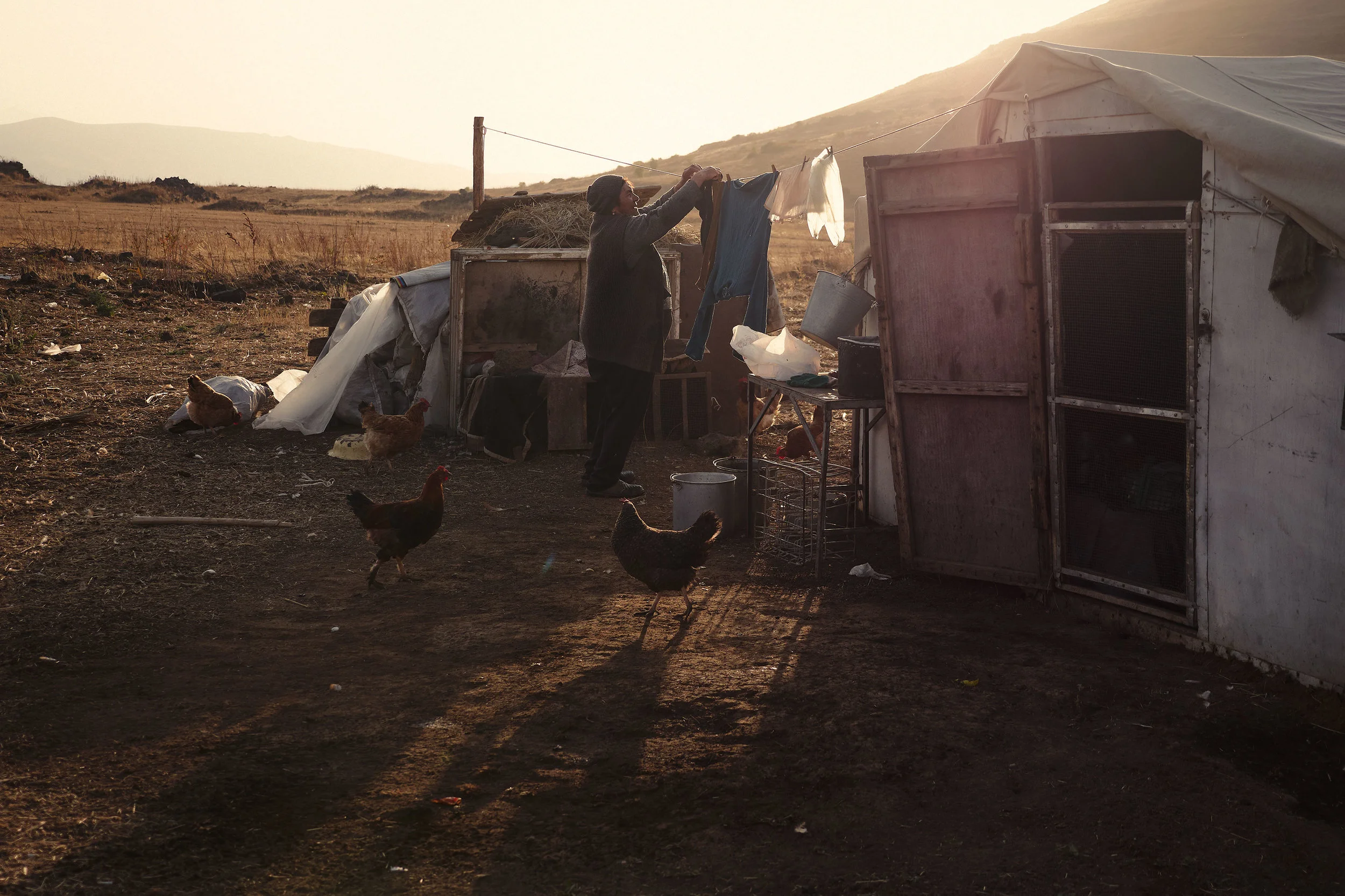 Armenia-Vayots-Sar-woman-hanging-laundry.jpeg