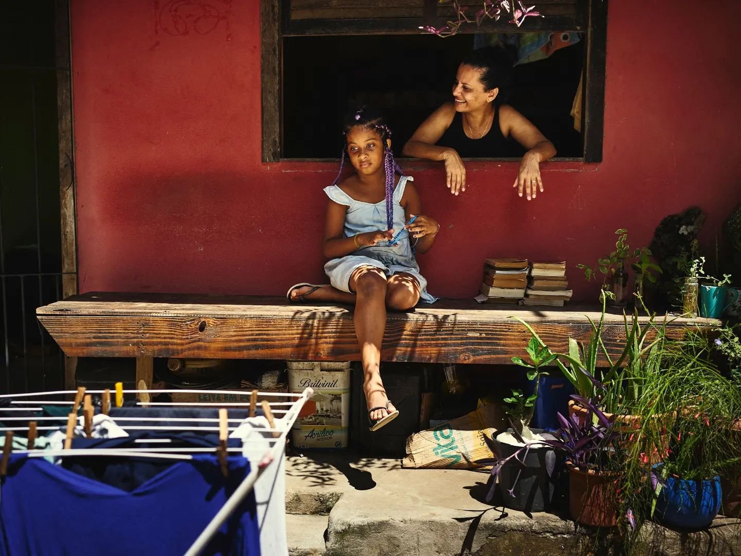 &quot;Are you family?&quot; I asked them. &quot;No, we're neighbours. But, I have a lot of affection for this little one and she does for me.&quot; 

I met Lu (woman) and Lara (girl) on the main street in Itacar&eacute;, Bahia. The people in these pa