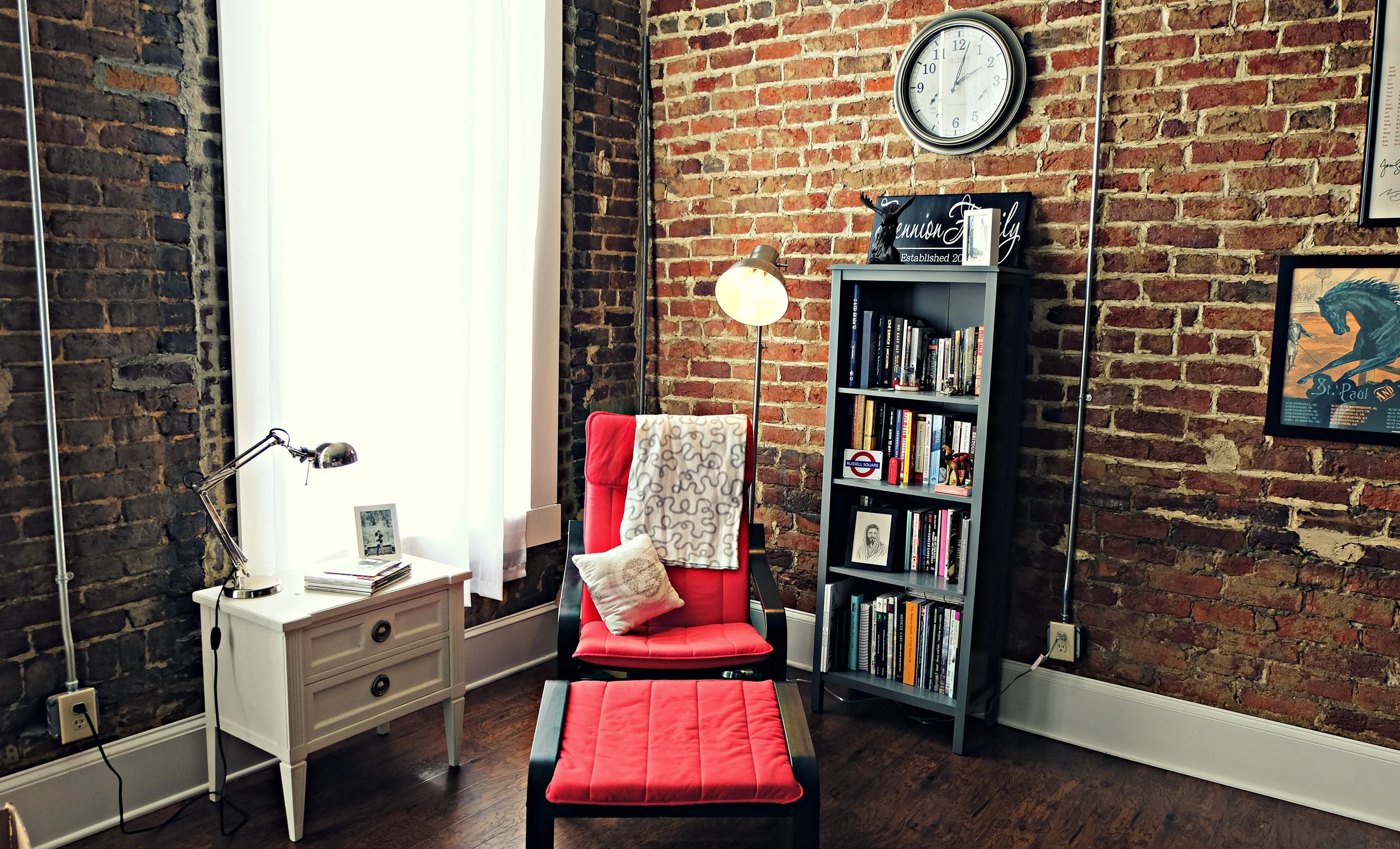 Chair -- Poang with black-brown frame and Ransta red cushion covers. Side Table -- Refinished solid wood bedside table from Goodwill. Paint is BEHR Premium Plus Ultra Paint Sample . Bookcase -- Windham 4 Shelf Bookcase from Target.