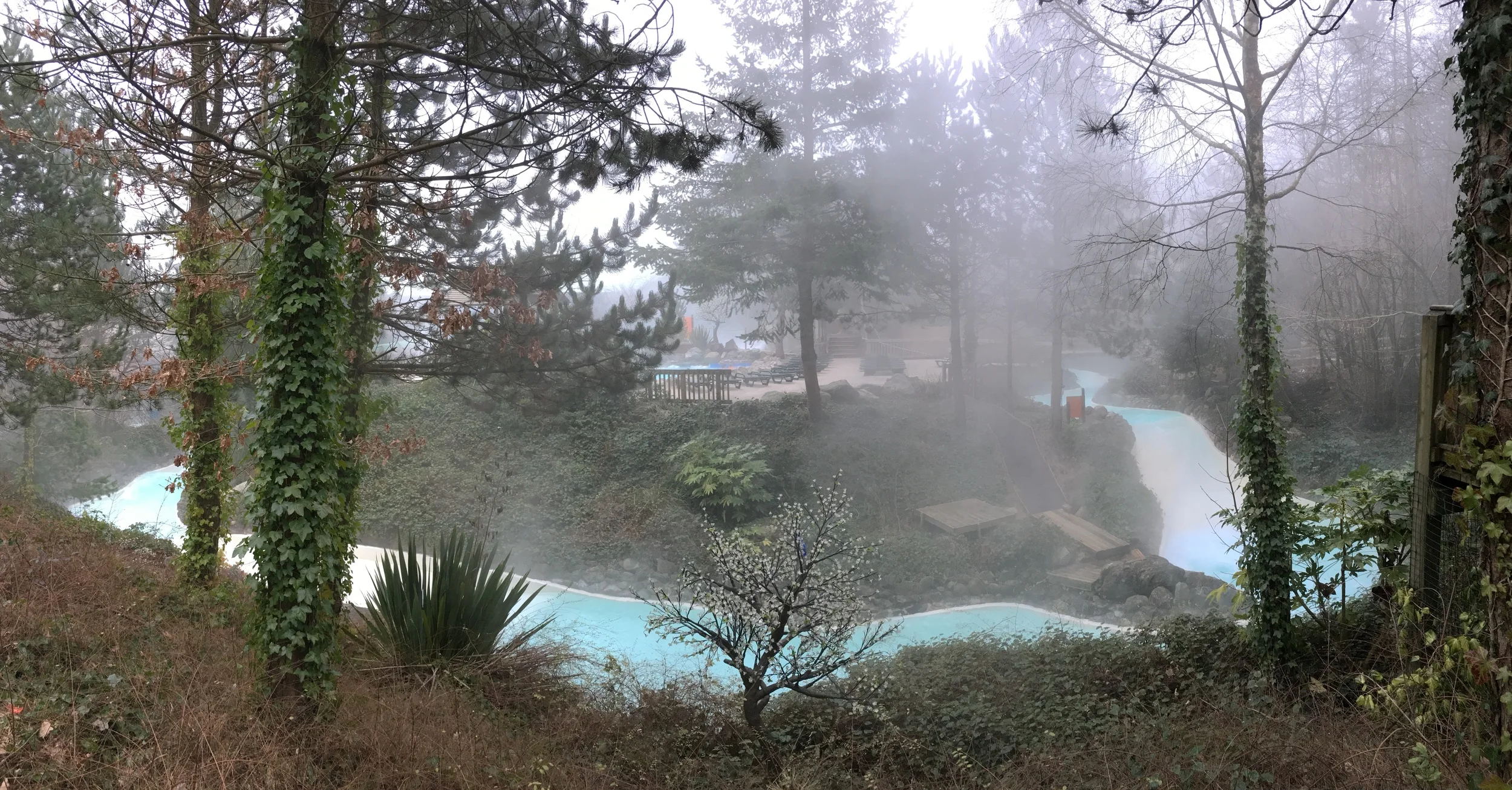 Icy fog over steaming rapids