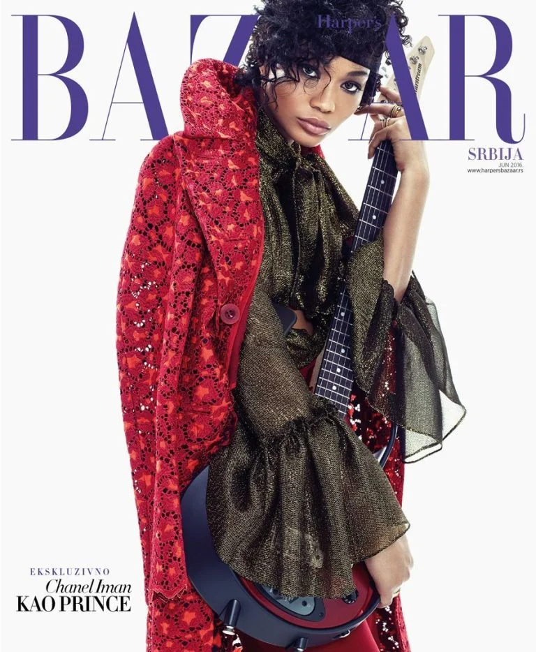 supermodel chanel iman harper's bazaar serbia prince tribute guitar cover fashion editorial feature kelsey randall black gold embroidered lurex chiffon sheer bell ruffle flounce sleeve button down blouse tie front pussy bow long red sacai coat refinery 29 fashionista 70's style retro daywear sportswear seventies hipster cool stylist made-to-measure womenswear bridal custom bespoke handcrafted sustainable ethical local production manufacturing made in new york city nyc brooklyn bushwick emerging designer ones to watch new talent rising star best of american fashion young designer Shot by Joshua Jordan and with art direction by Christopher Sollinger, the Harper's Bazaar Serbia shoot features Chanel Iman dressed to embody some of Prince’s most iconic looks, ranging from Purple Rain and Dirty Mind to Plectrumelectrum. Everyone will recognize Prince's iconic lace gloves and curling locks (courtesy of stylist Kisha C. Jones), but there are a few Easter eggs for hardcore fans of The Purple One, including the set itself, clearly visible in the video teaser. The photos were shot at Electric Lady Studios. (Says Jordan, “Jimi Hendrix owned and designed the studios — it hasn’t changed since the ‘70s, and Prince loved it there.”) When it came to hair and makeup, Iman came equipped with her own personal inspiration: her mother. Jordan adds, "She showed us pictures of her mom in the Afro, and when she put it on, it was as if we moved into the future and flashed back to the past." Makeup artist Yacine Diallo was not only inspired by Prince, but also the strong women in his life: "The story was also a tribute to all the talented, beautiful, and sexy women like Vanity 6, Sheila E., Wendy, and Lisa he had on stage with him throughout his career. Chanel Iman was perfect to interpret this sensuality and freedom that always inspired me while growing up watching Prince videos and listening to his music."