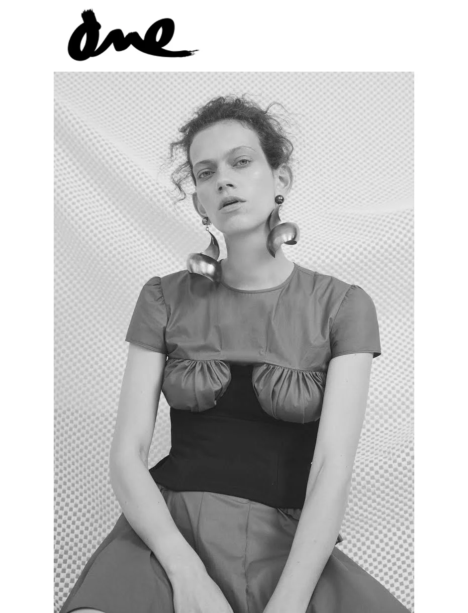 One Magazine editorial fashion feature black and white photography Kelsey Randall waxed cotton ruffle dress waist cincher corset hoop earring made-to-measure bespoke custom sustainable ethical local production made-to-measure womenswear luxury New York City made in Brooklyn Bushwick NYC Osvaldo Ponton Olivia Weeden Bannet Grey Eric Bosburg Lauren BahrKate Ryan Carolin Sunderhauf