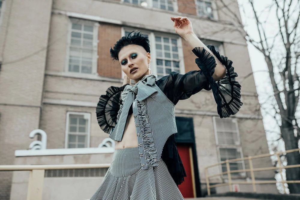 Lydia Hudgens shoots Kelsey Randall black navy and white striped canvas high waisted yoke circle skirt with matching sleeveless button down ruffle front top with neck tie enamel buttons