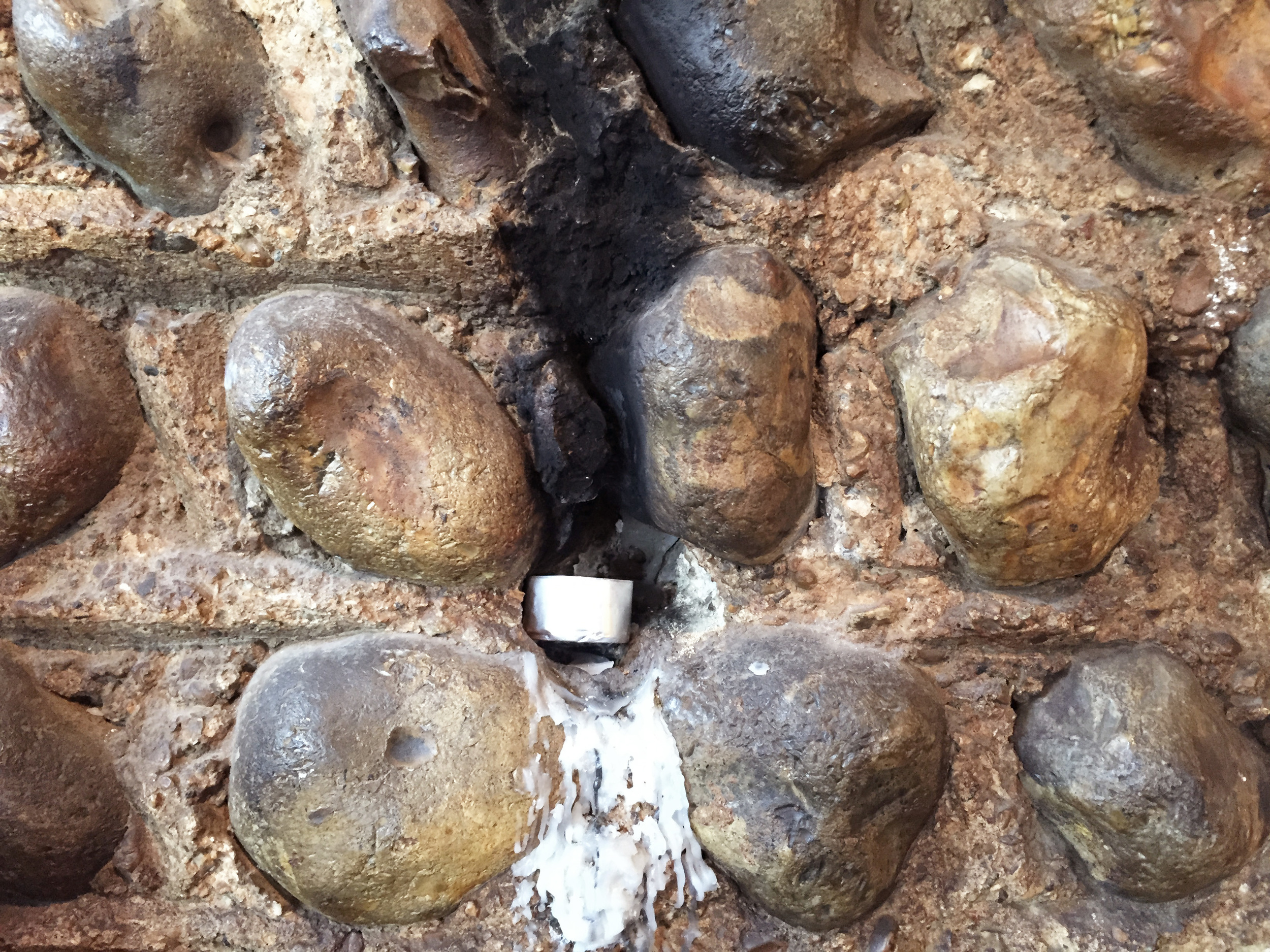 Stone Wall and Candle