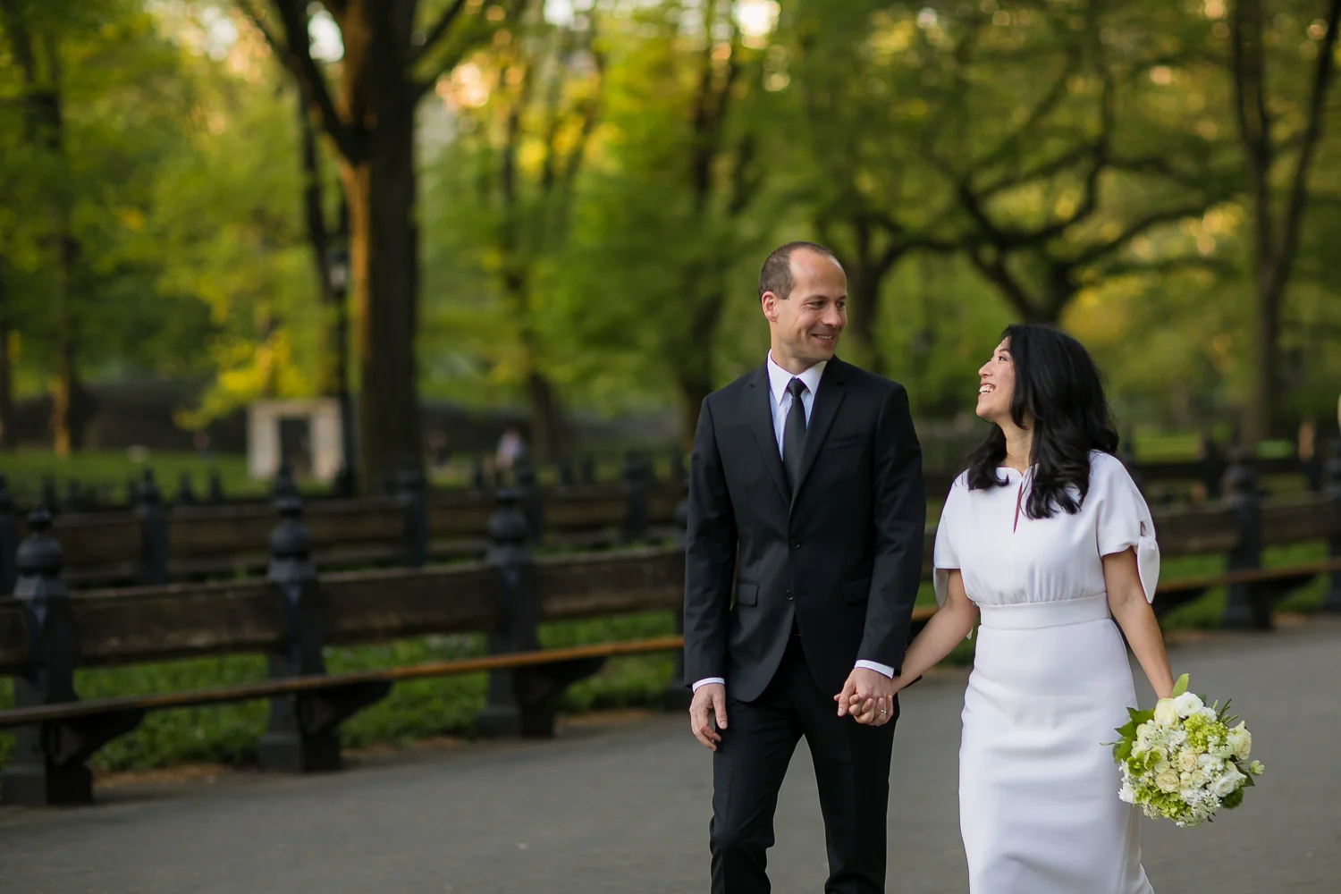 Bride and groom taking wedding photos at the mall in Central Park. | Early Morning Sunrise Central Park Elopement in New York City.