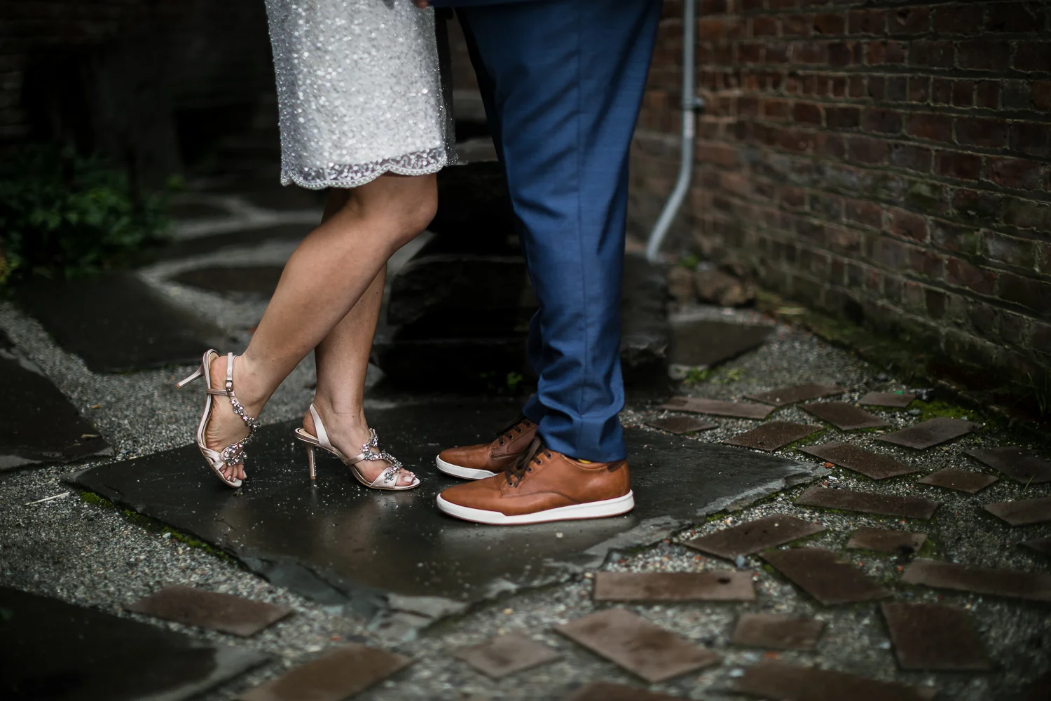 Close up wedding portraits of bride wearing jeweled sandals and groom wearing brown shoes | Intimate Wedding at the Malthouse in Manhattan, New York City.