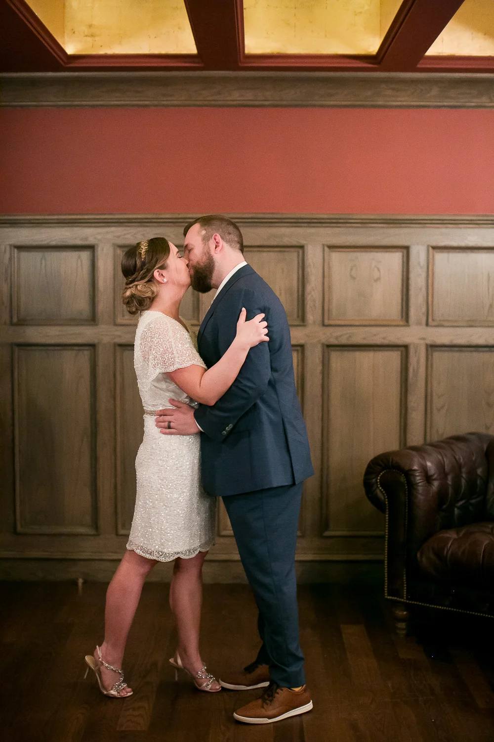 Bride and groom first kiss at an Intimate Wedding at the Malthouse in Manhattan, New York City.