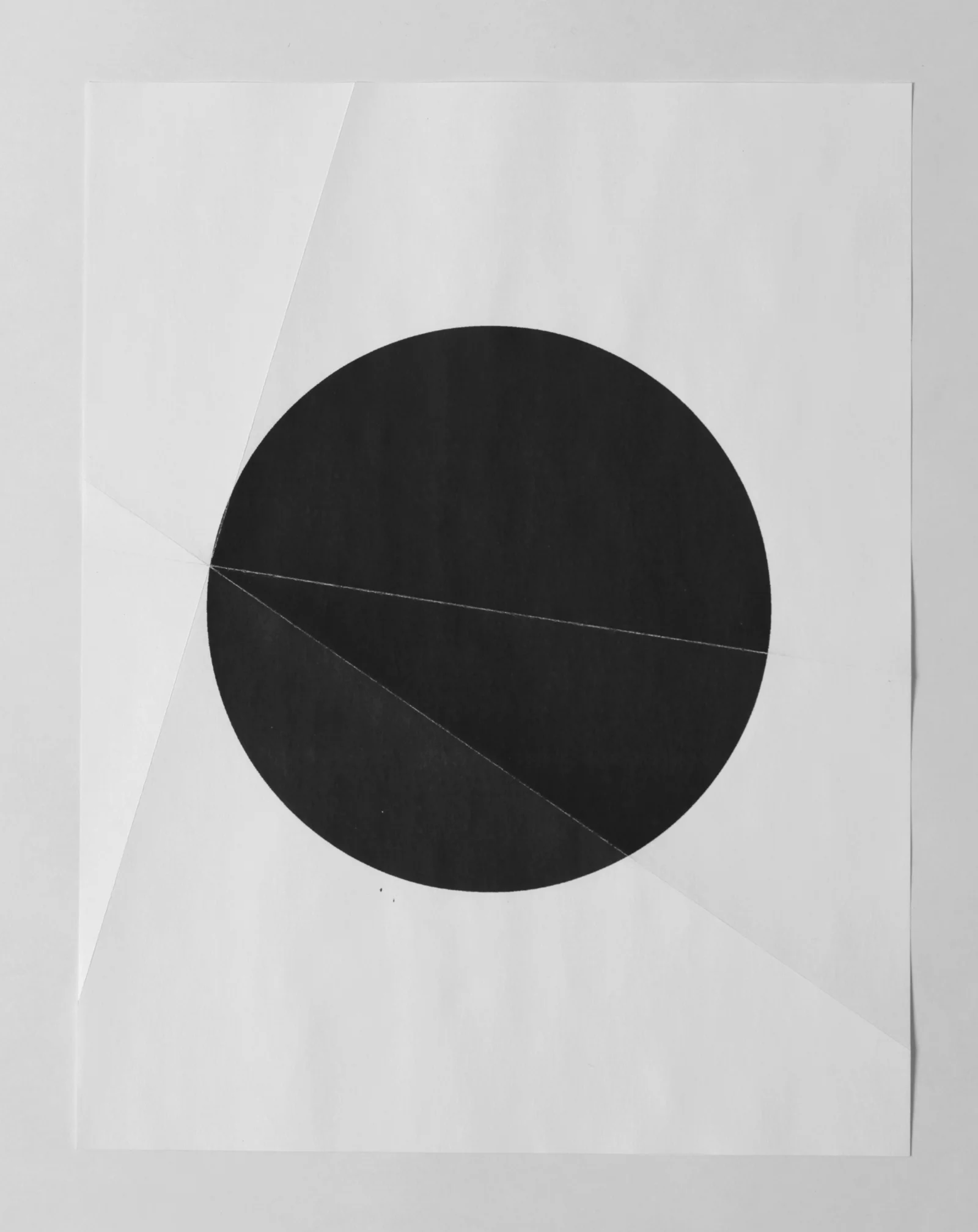   from the ongoing series: O/, Divided/Defined, Weights, Measures, and Emotional Geometry  2013, Folded photocopied circle. 8 x 10 inches folded 