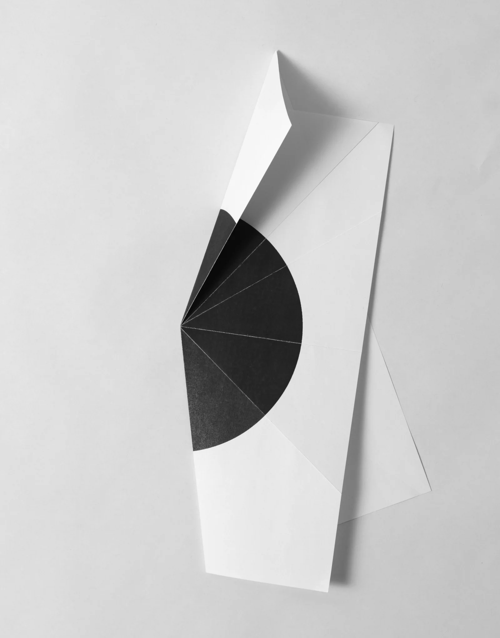   from the ongoing series: O/, Divided/Defined, Weights, Measures, and Emotional Geometry  2013, Folded photocopied circle. 8 x 10 inches folded 