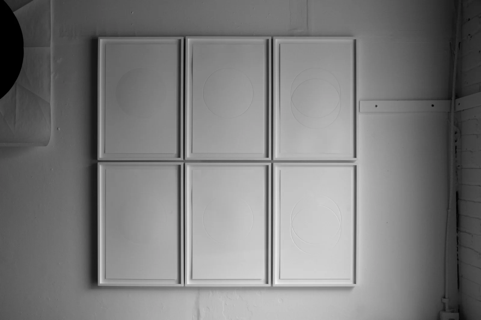   from the ongoing series: O/, Divided/Defined, Weights, Measures, and Emotional Geometry  2013, Blind letterpress from polymer plates. 11 x 17 inches each (pictured here framed) 