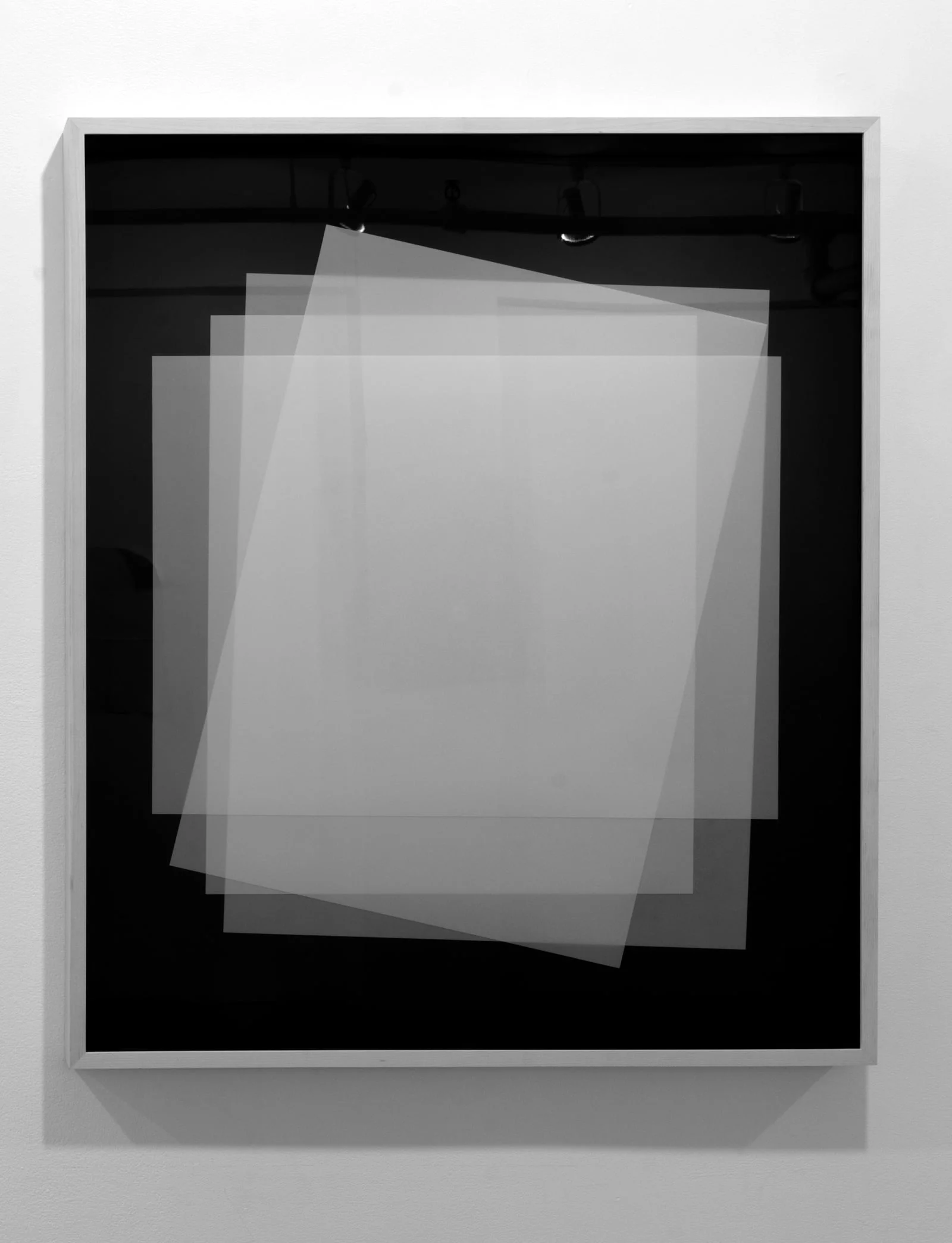   Untitled (layered #1)  White Mylar layered on black museum board.&nbsp; 2014, 30 x 35 inches    