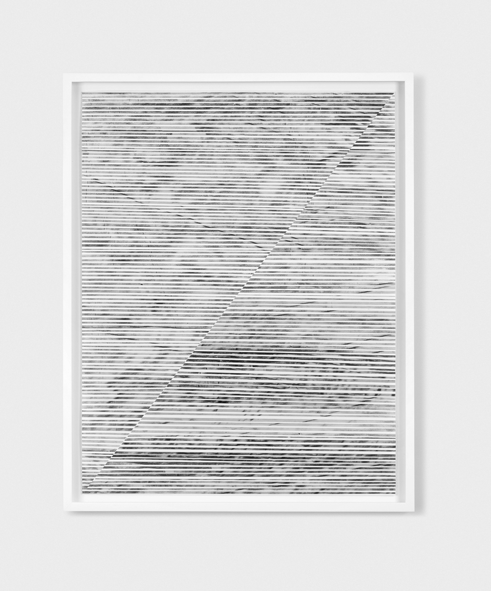    Untitled (the line between #1)  2014, charcoal and powdered graphite on translucent tape, cut and arranged on cotton paper, 22 x 28 inches  
