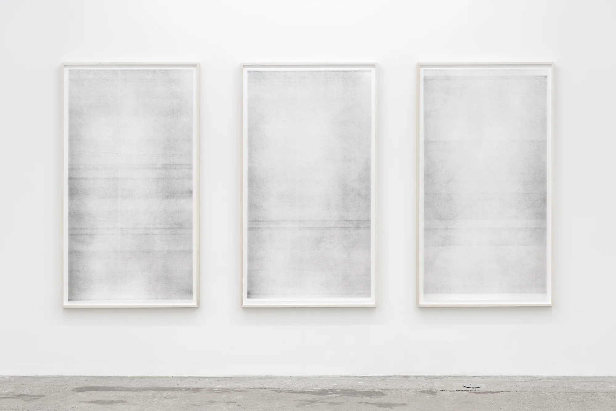   Untitled Triptych (when it settles #3, #4, and #5, from the series A Certain Silence) , 2017, Oil based paint, graphite and charcoal on tarlatan, layered, 59 x 35 inches each. 